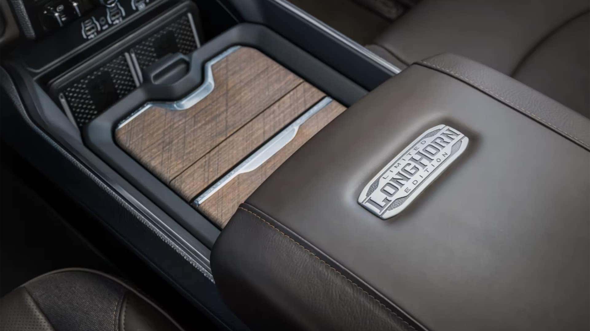 2026 RAM 3500 interior driver cockpit with large touchscreen display, center console, and premium seating