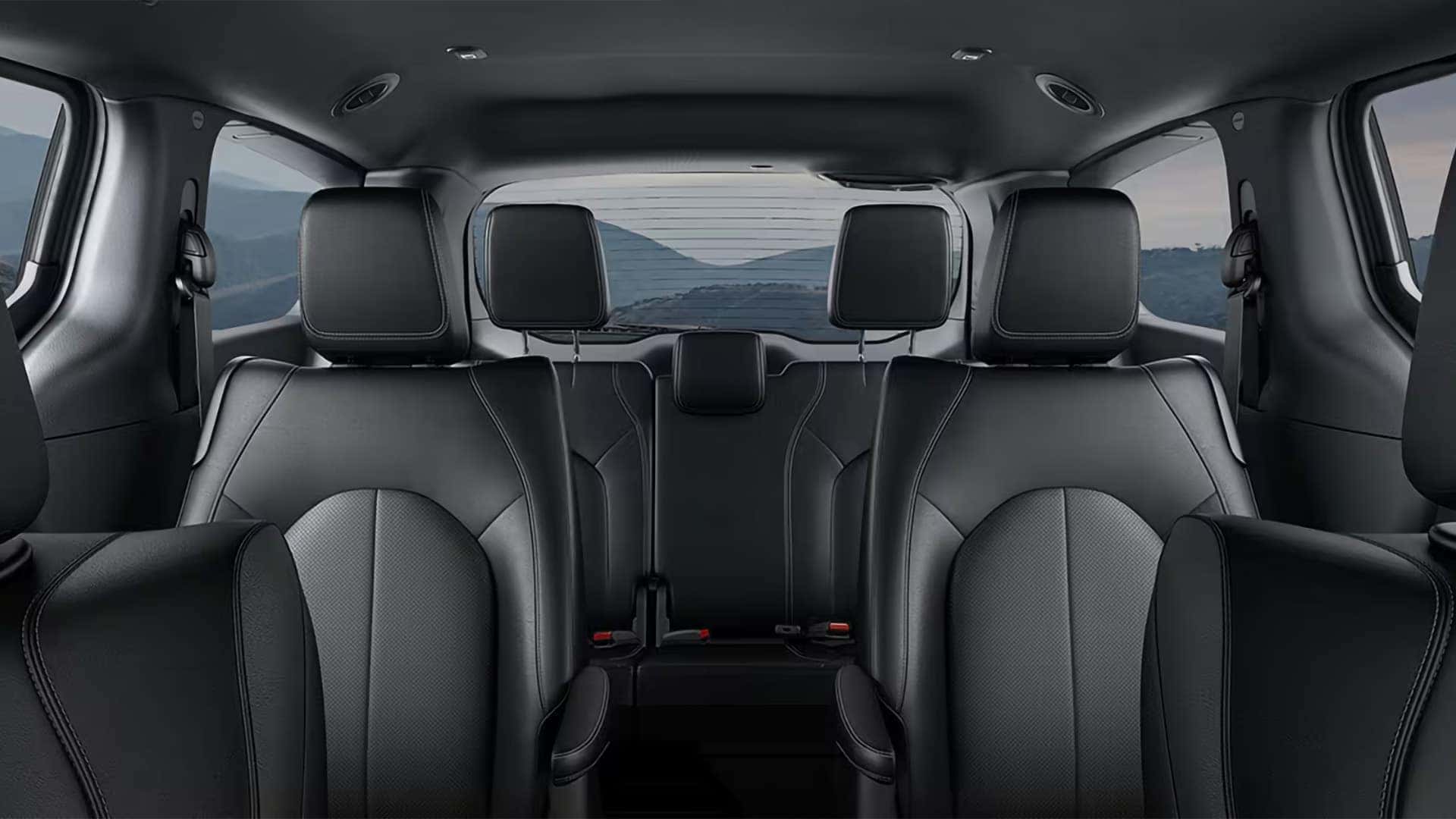 Third-row seating inside the 2026 Chrysler Voyager showing spacious rear passenger area with three headrests