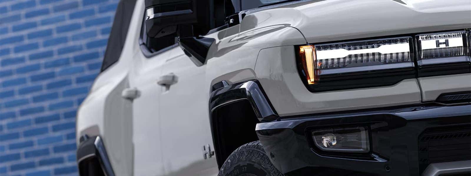 2026 GMC HUMMER EV SUV front design with LED lighting and bold electric SUV styling