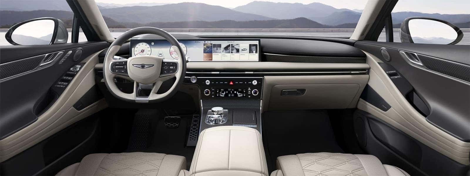 2026 Genesis G80 interior with 27-inch OLED display, premium dashboard layout, and luxury sedan cabin design