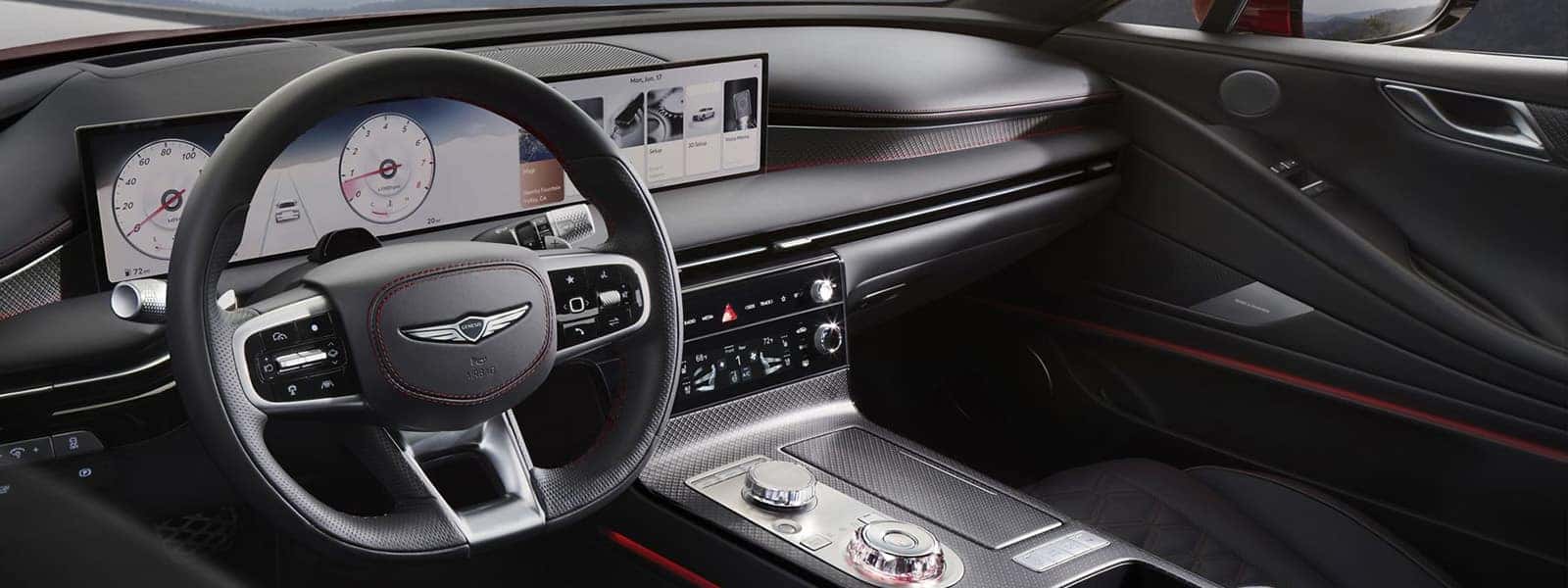 2026 Genesis G80 interior with panoramic OLED display, digital gauges, and modern luxury driver cockpit