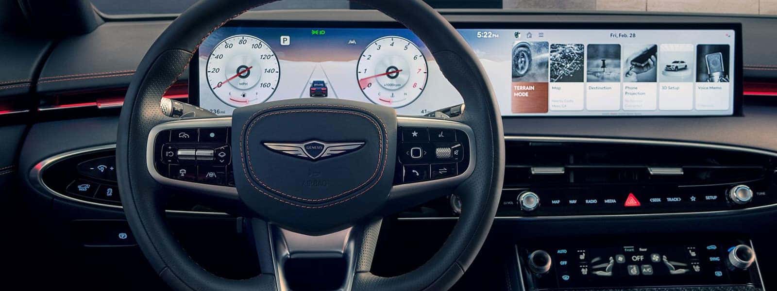 2026 Genesis GV70 technology cockpit with 27-inch OLED display, digital gauges, navigation, and infotainment controls