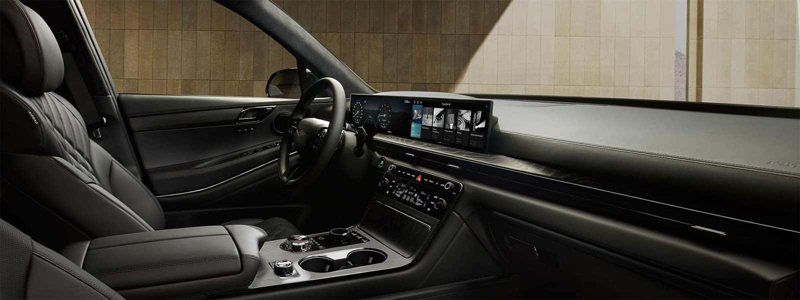 2026 Genesis GV80 interior with wide OLED display, leather seating, and modern luxury dashboard layout