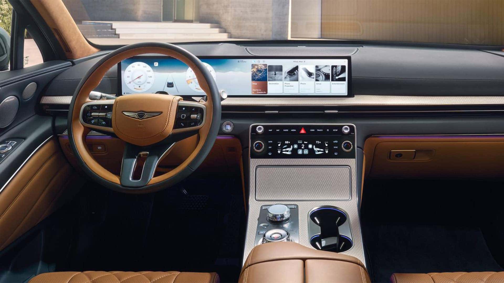 2026 Genesis GV80 cockpit with panoramic OLED display, digital controls, and premium interior design