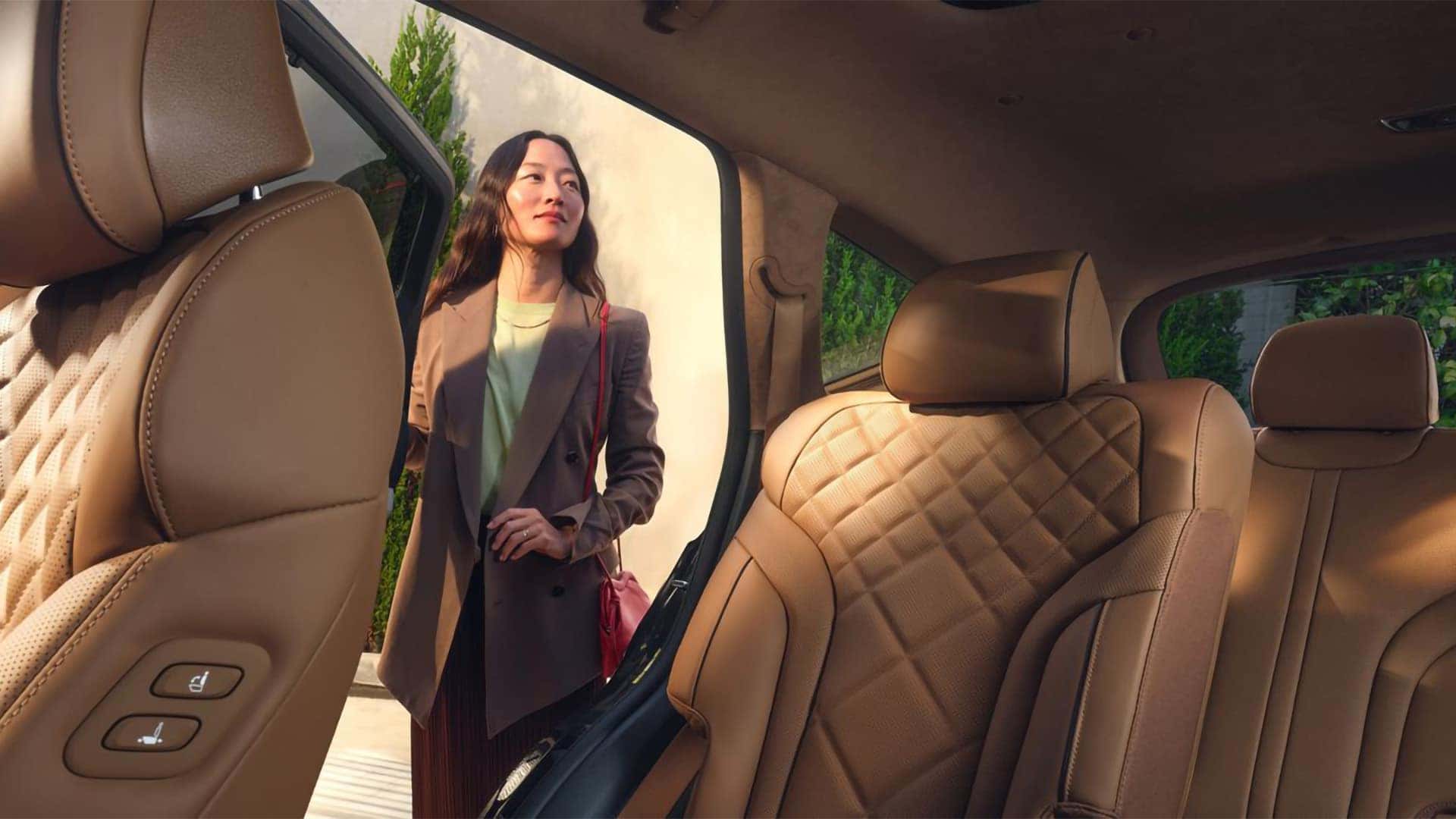 2026 Genesis GV80 front cabin with steering wheel controls, digital display, and premium interior design details