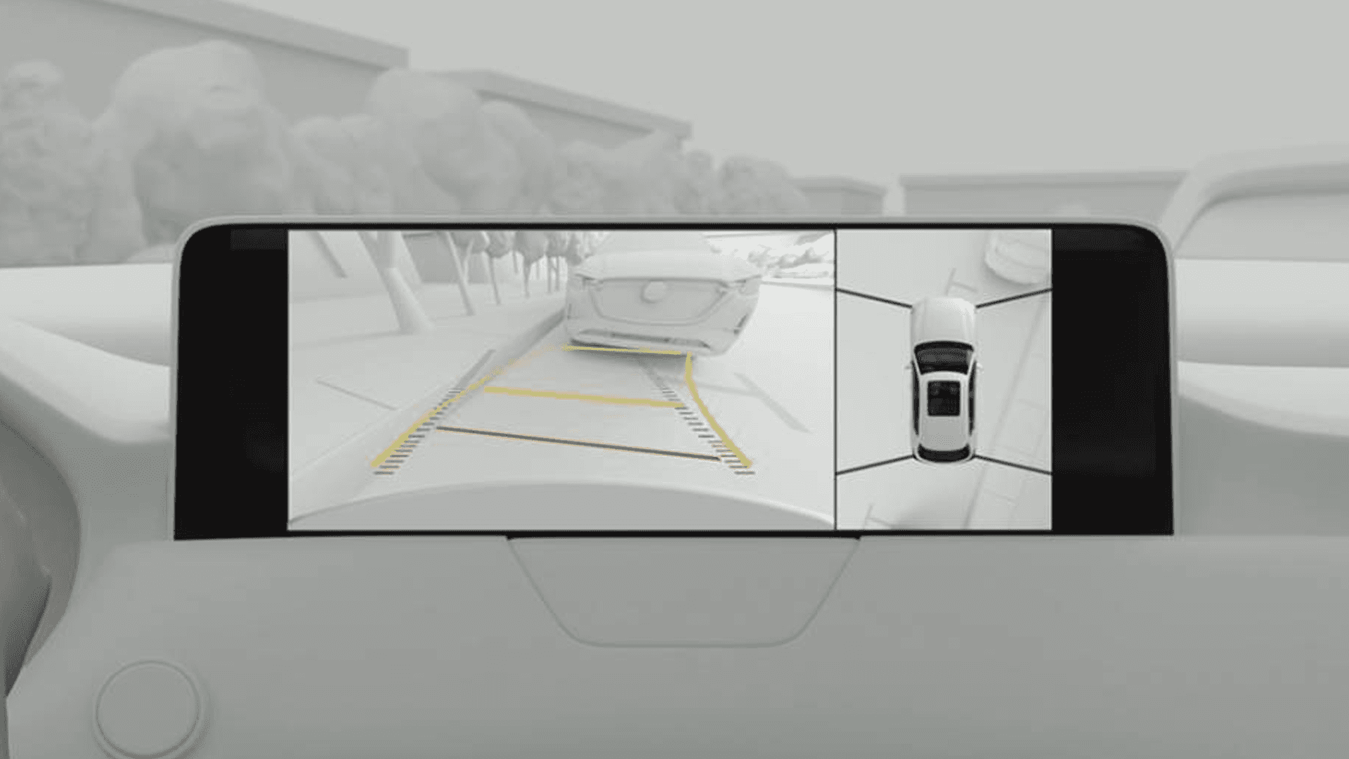 Center display showing rear camera view with parking guidelines beside a split-screen overhead vehicle view.
