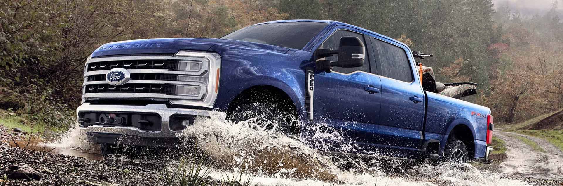 2026 Ford F-350 Super Duty parked on a work site highlighting heavy duty truck capability and bold exterior design