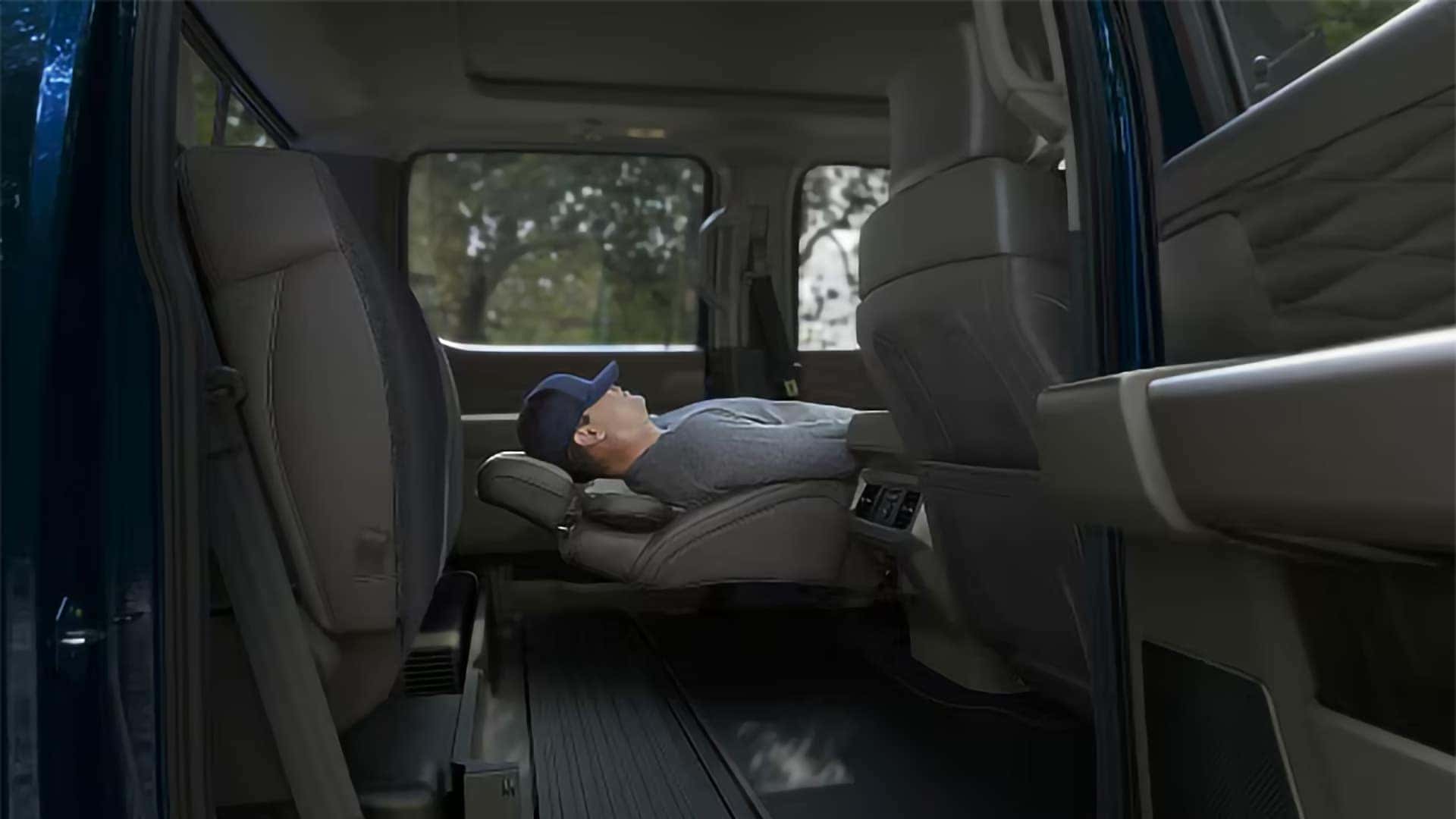 Front seats in the 2026 Ford F-350 Super Duty with premium upholstery and spacious cabin layout