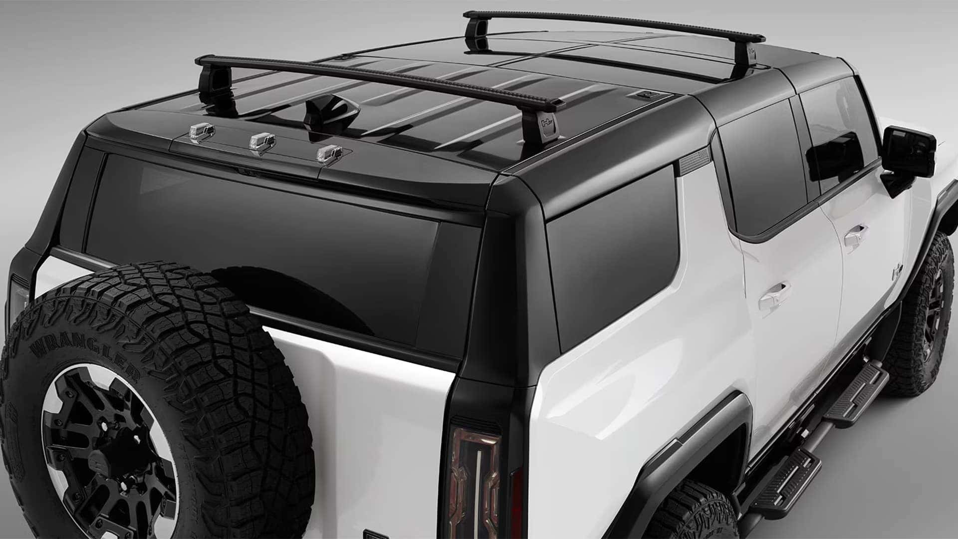 Top rear view of 2026 GMC HUMMER EV SUV showing roof design, roof rack, and exterior proportions
