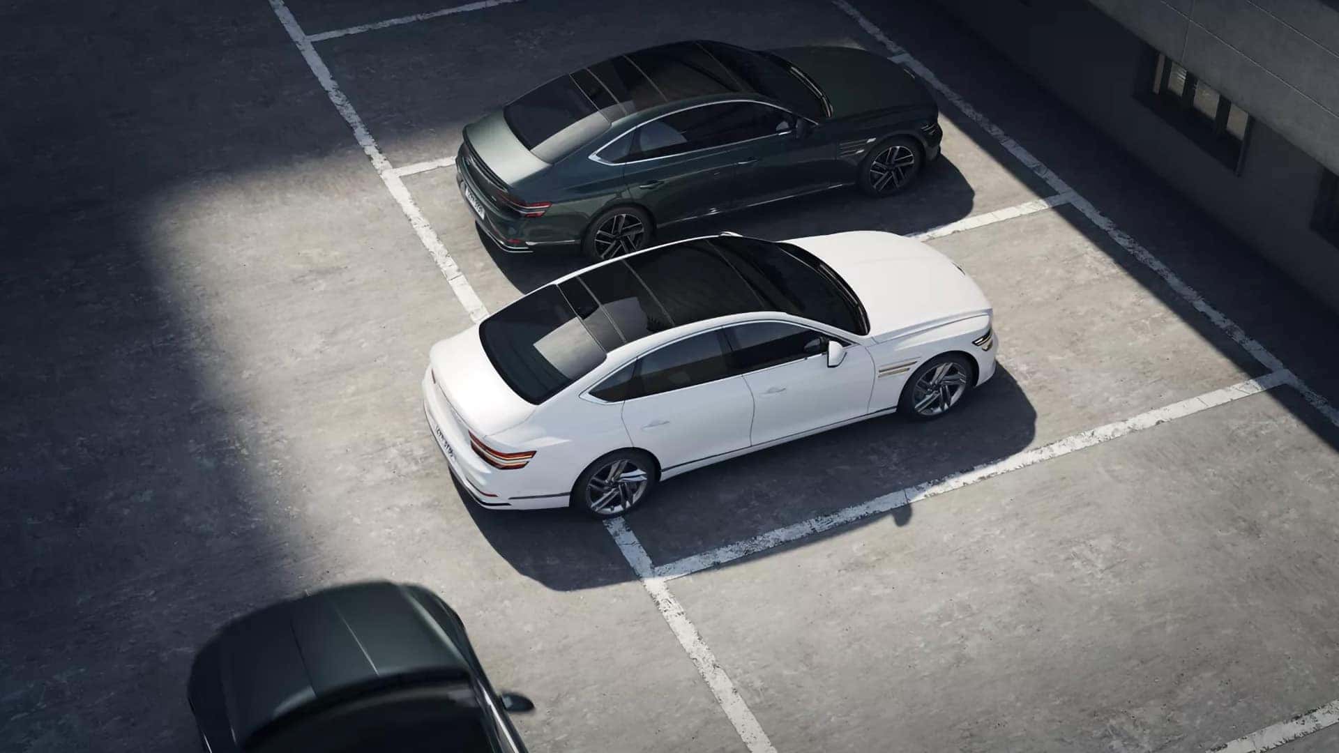 2026 Genesis G80 using surround view camera system for parking assistance in a multi-space parking lot