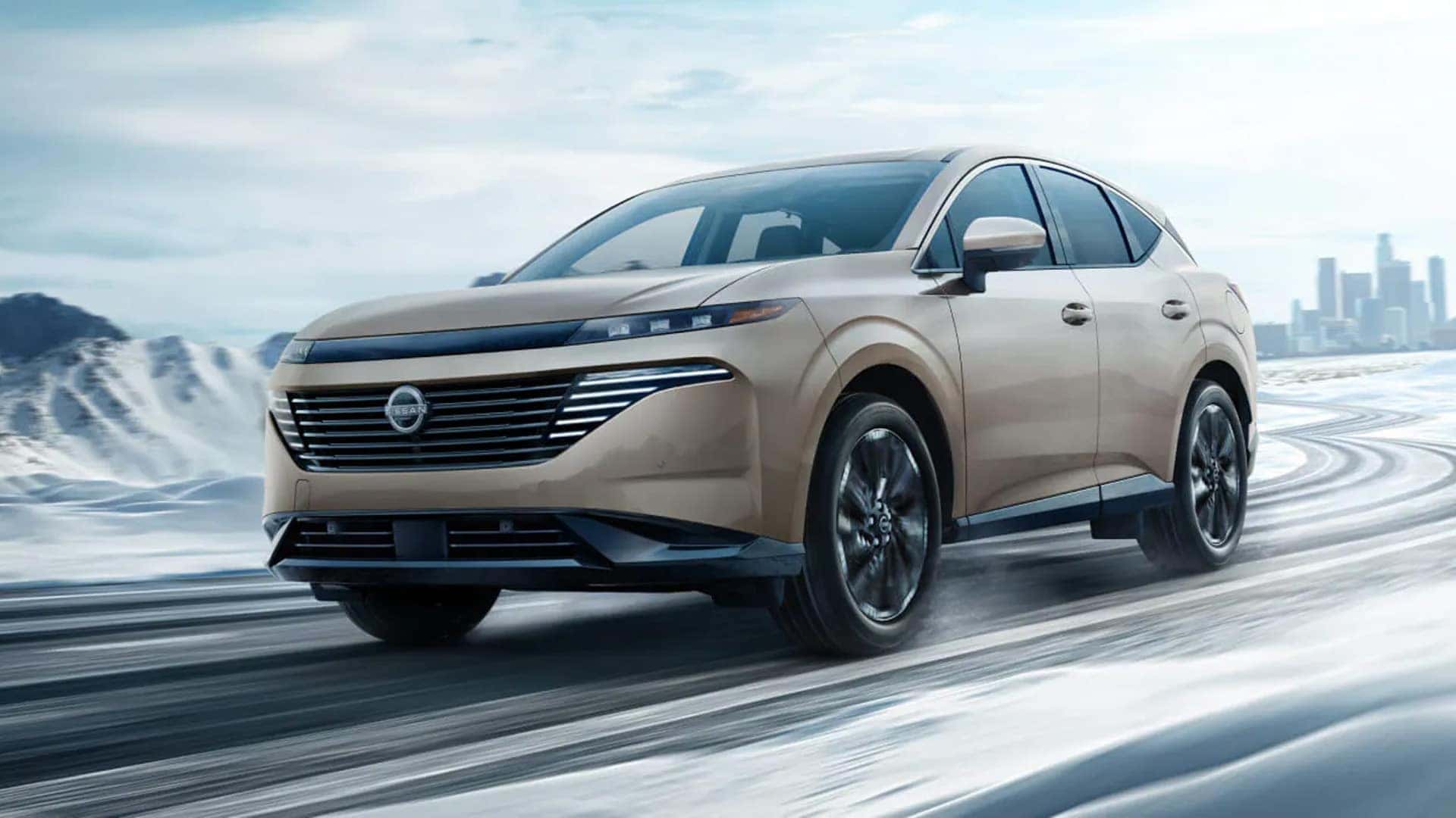 2026 Nissan Murano driving on a snowy road to highlight all wheel drive performance and traction