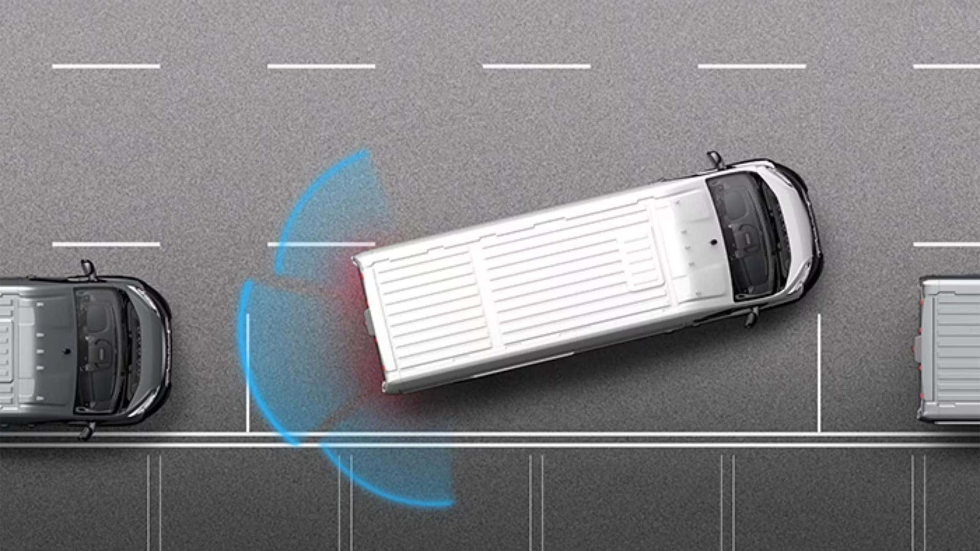 Overhead view of 2026 RAM ProMaster Cargo Van using driver assistance system while maneuvering into a parking space