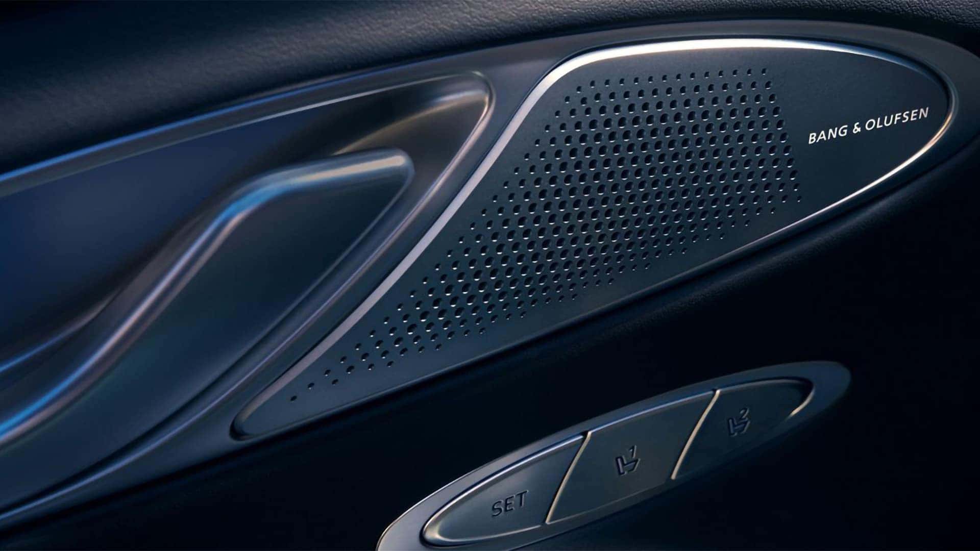 Bang and Olufsen speaker in the 2026 Genesis GV70 interior with premium perforated metal grille