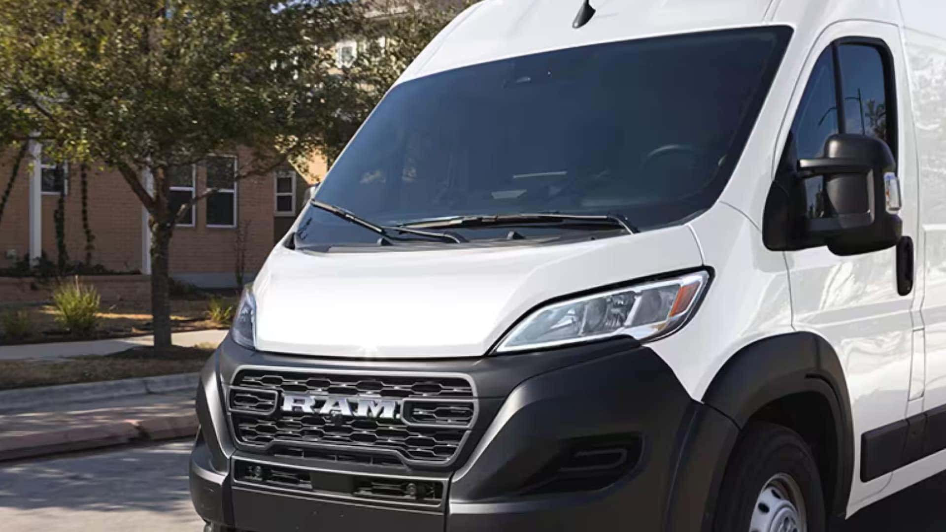 Front angle of 2026 RAM ProMaster Cargo Van highlighting large windshield and side mirrors for visibility