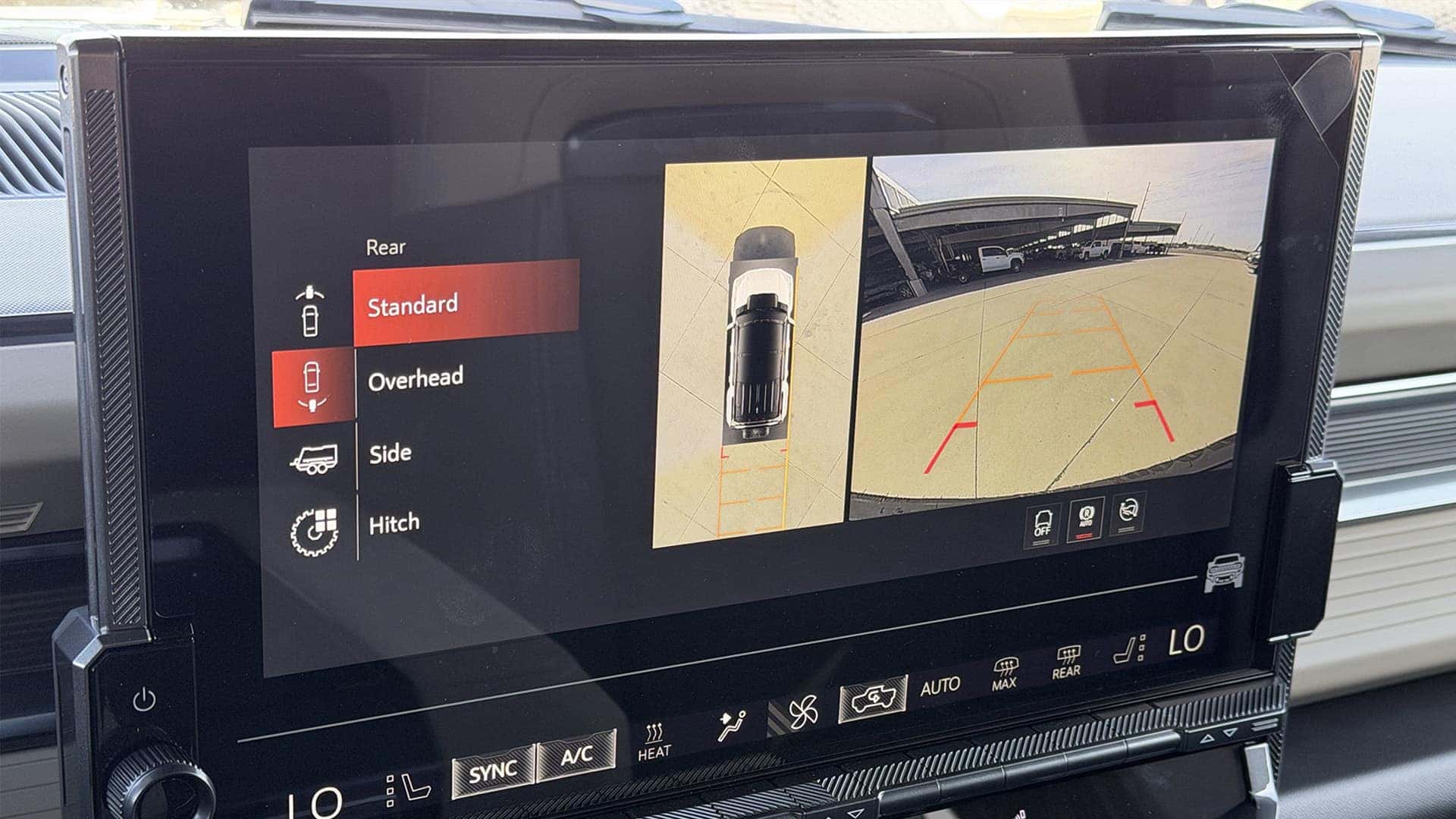 2026 GMC HUMMER EV SUV display showing UltraVision camera views and trail driving technology