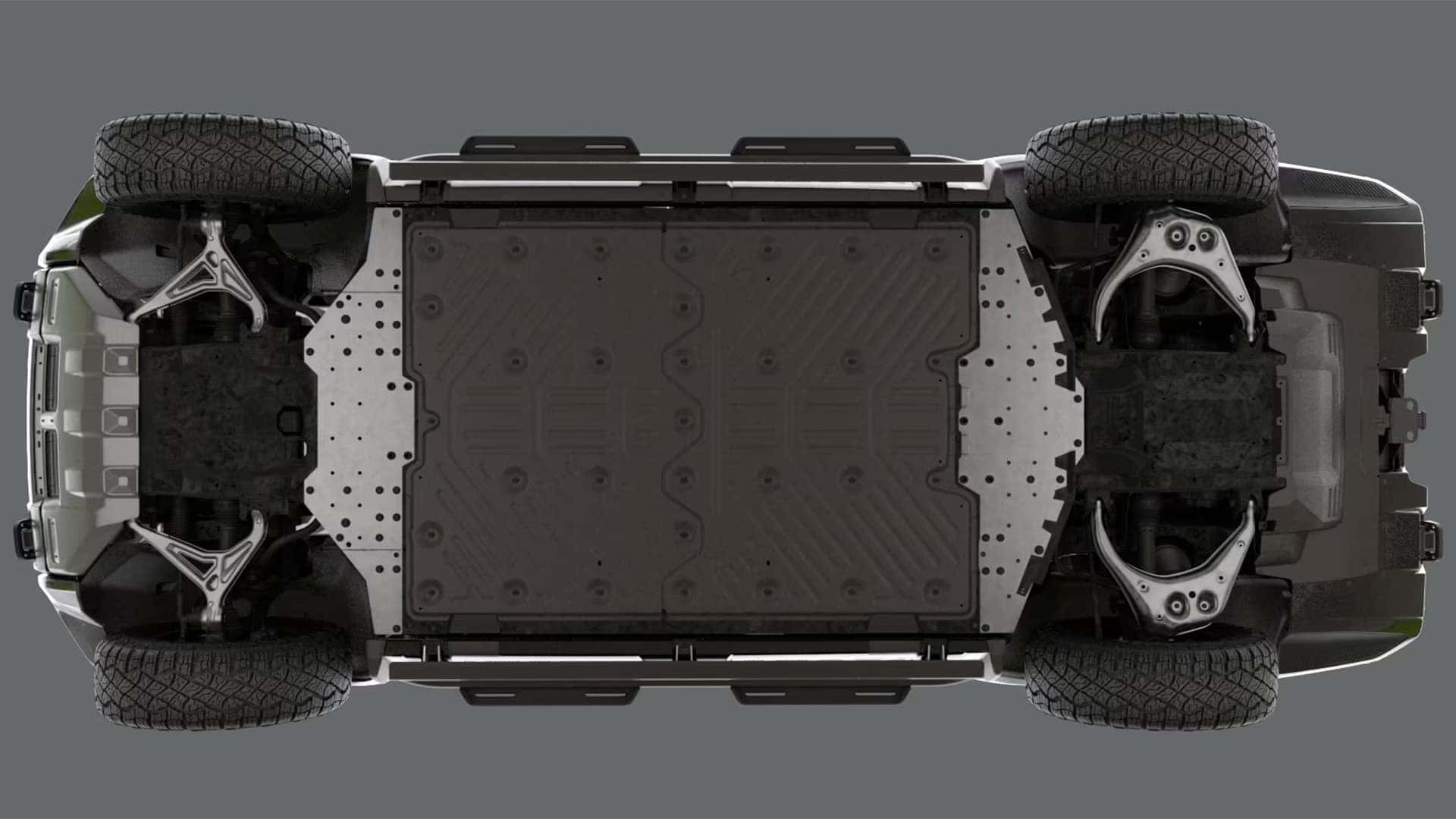Underside view of 2026 GMC HUMMER EV SUV showing underbody armor and off-road protection components