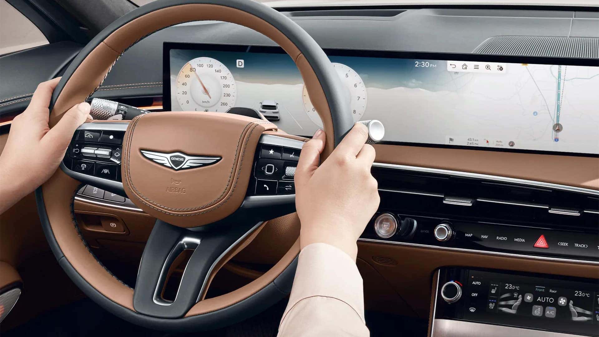 2026 Genesis GV70 driver cockpit with two-tone steering wheel, wide digital display, navigation, and climate controls