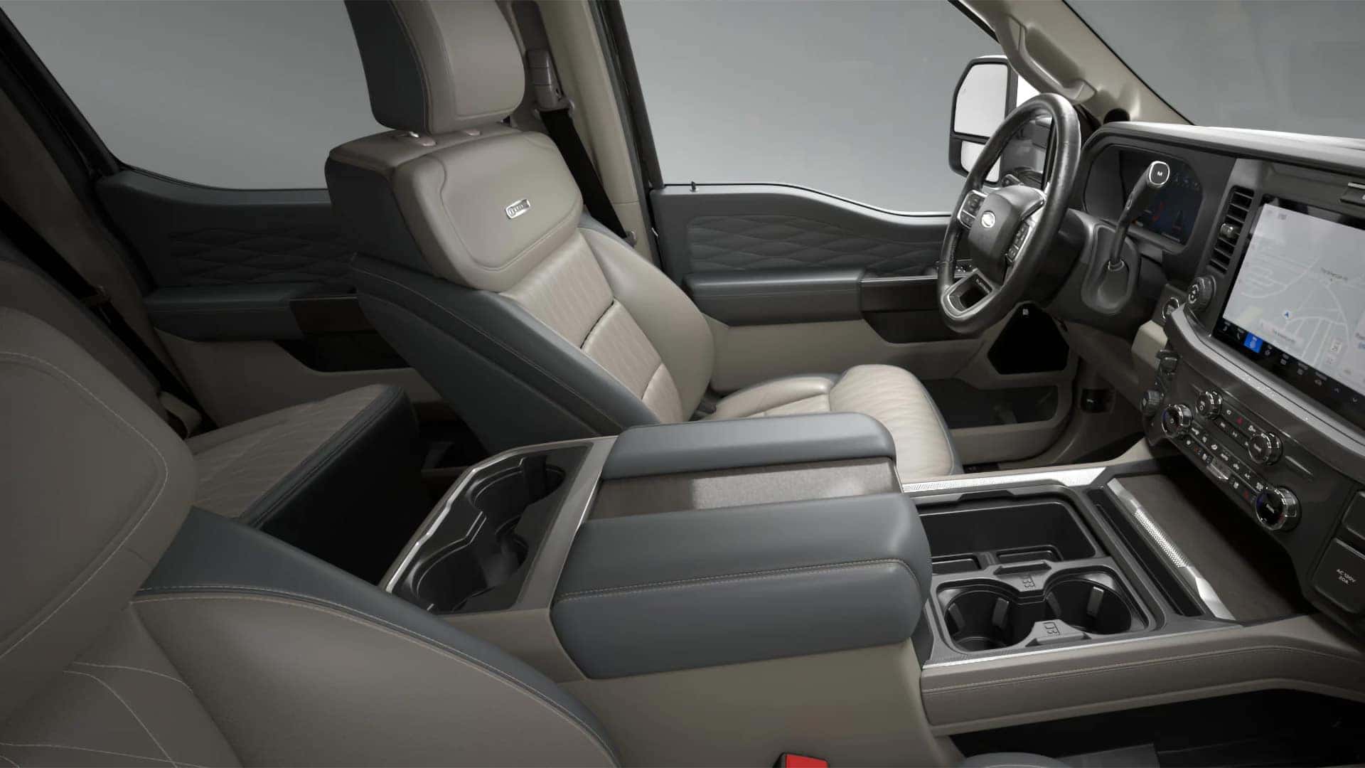 Interior work surface in the 2026 Ford F-350 Super Duty with a laptop setup for mobile productivity