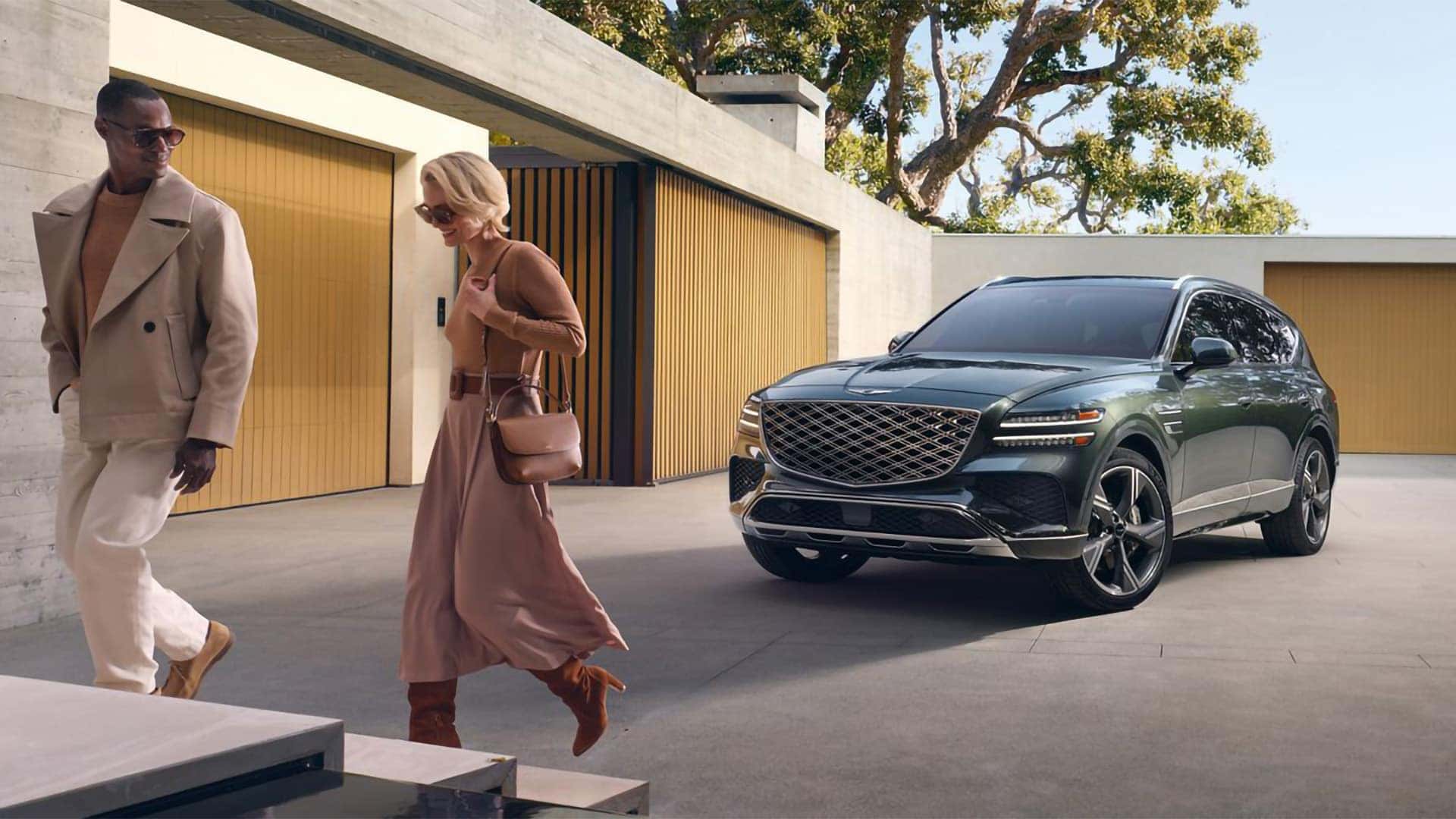Close up of Genesis GV80 front grille and Genesis emblem with integrated front camera detail