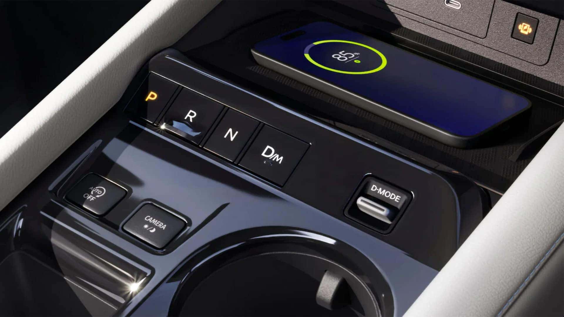 Center console of the 2026 Nissan Murano with wireless charging pad, drive mode selector, and push-button gear controls