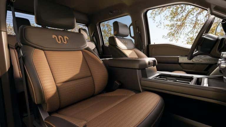 Premium front seating and center console in the 2026 Ford F-350 Super Duty with upscale trim details
