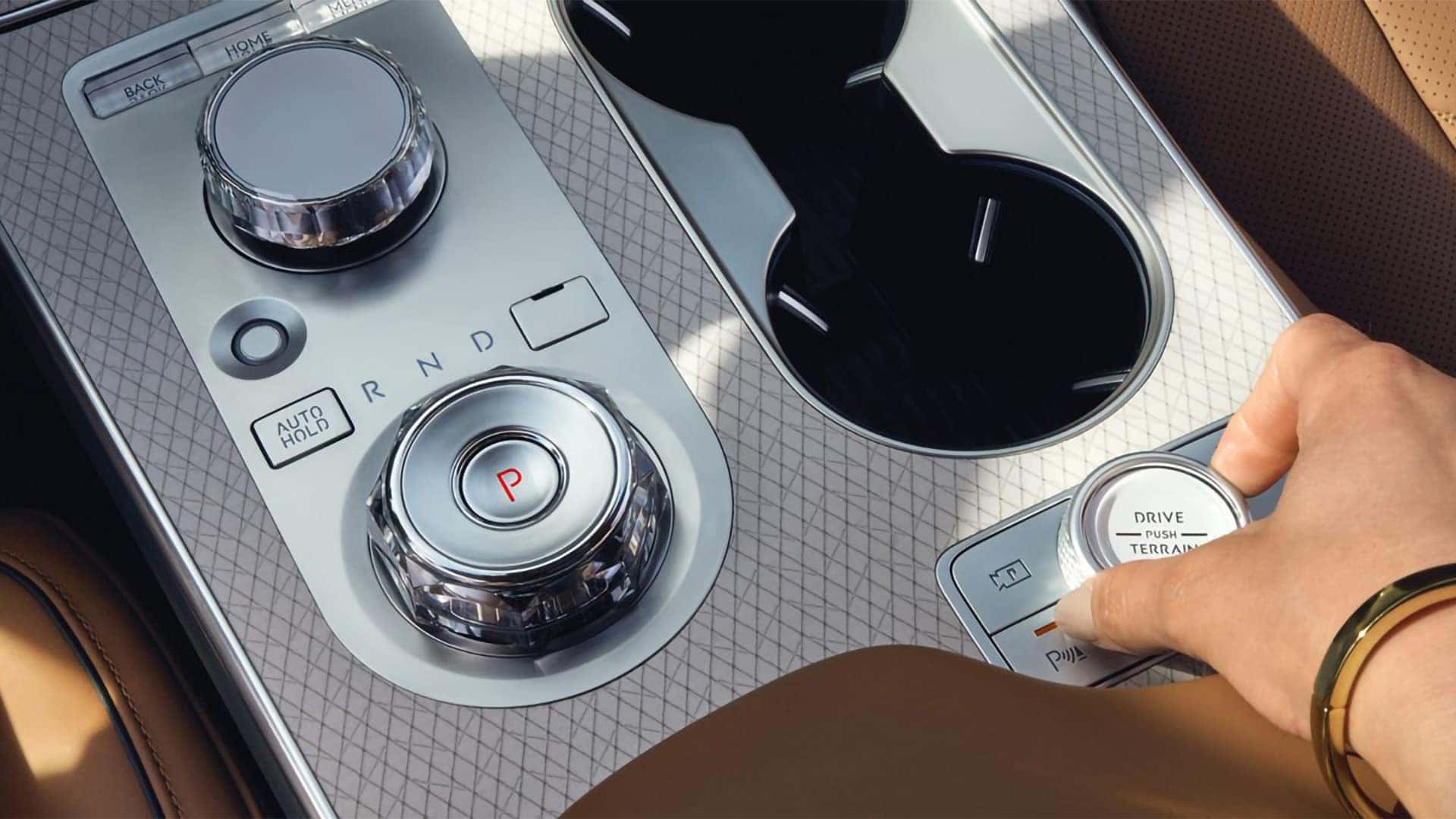 Genesis GV80 interior control dial and drive mode selector with premium trim detailing