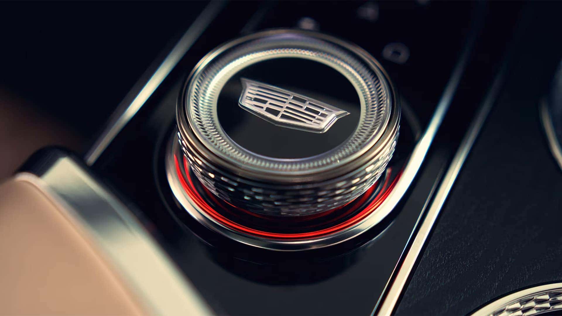 Close-up of the 2026 Cadillac LYRIQ interior control dial with Cadillac crest and illuminated trim