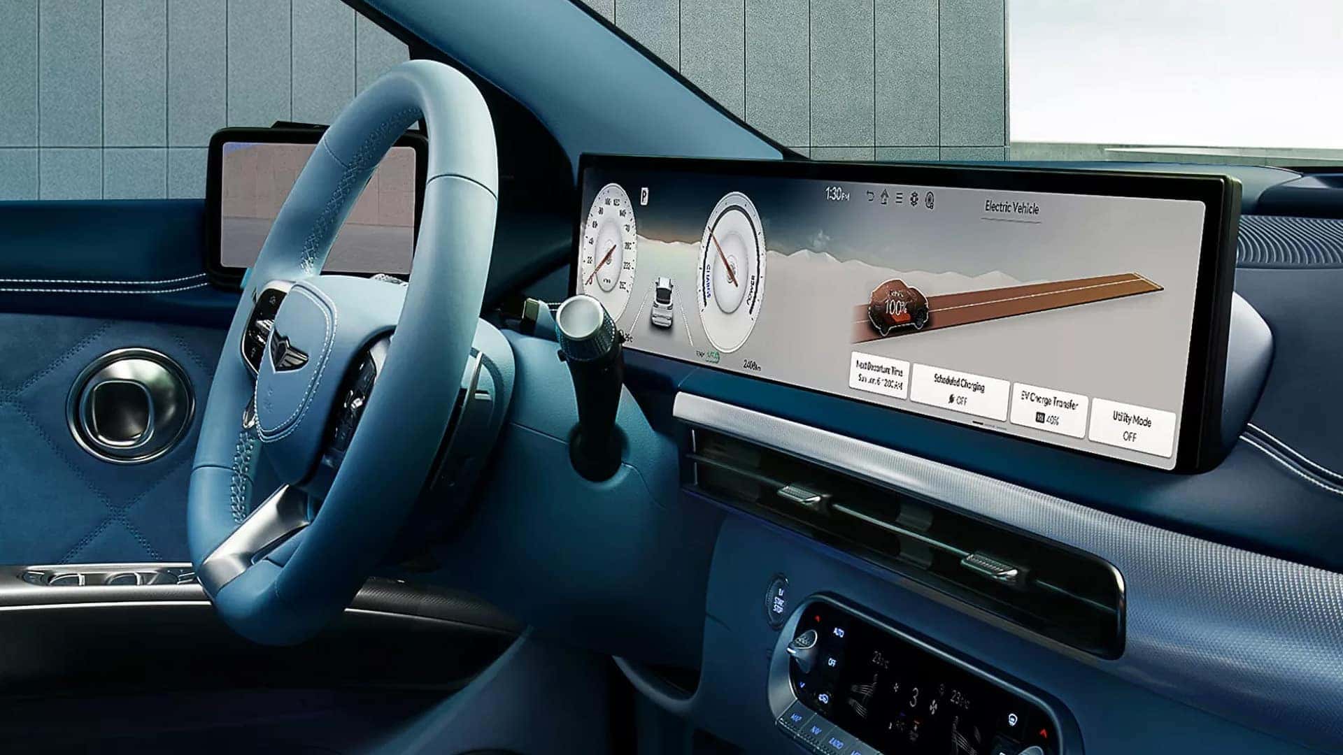 2026 Genesis GV60 cockpit with OLED display showing electric vehicle information and driver technology controls