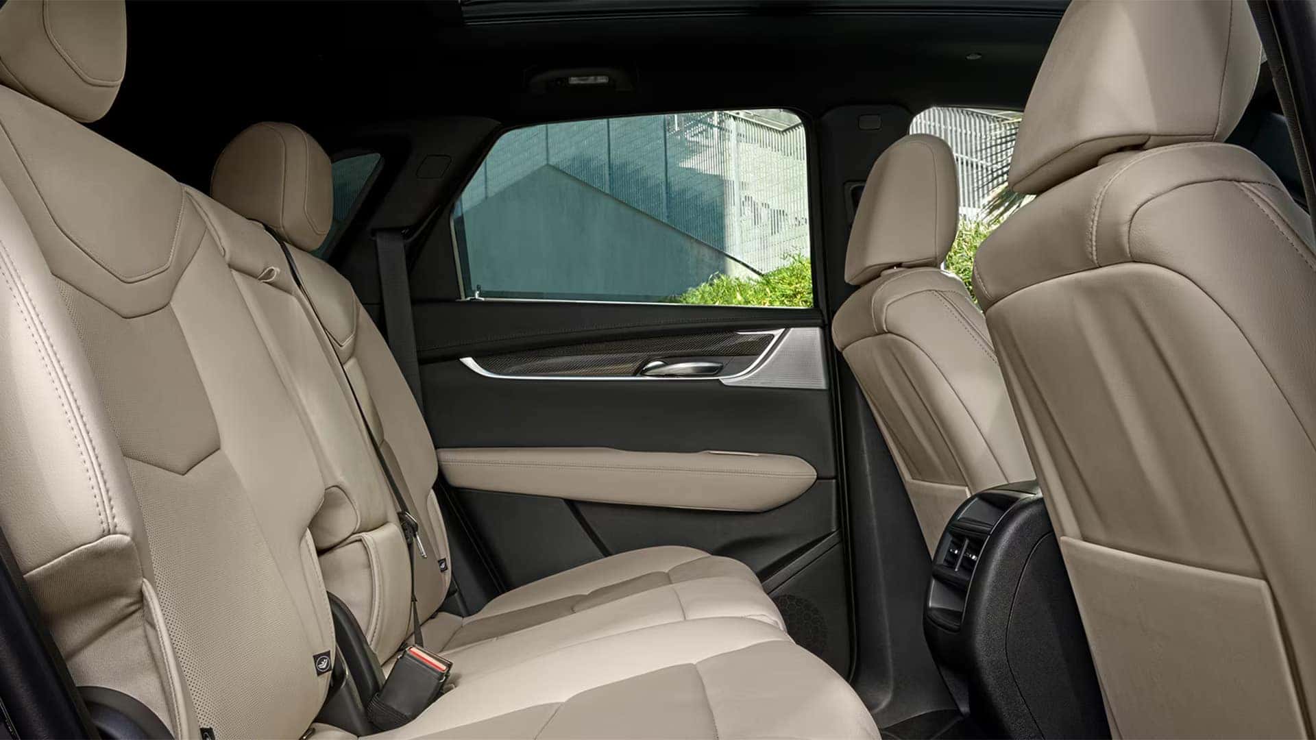 2026 Cadillac XT5 rear passenger area with leather seating, spacious second row, and premium interior trim