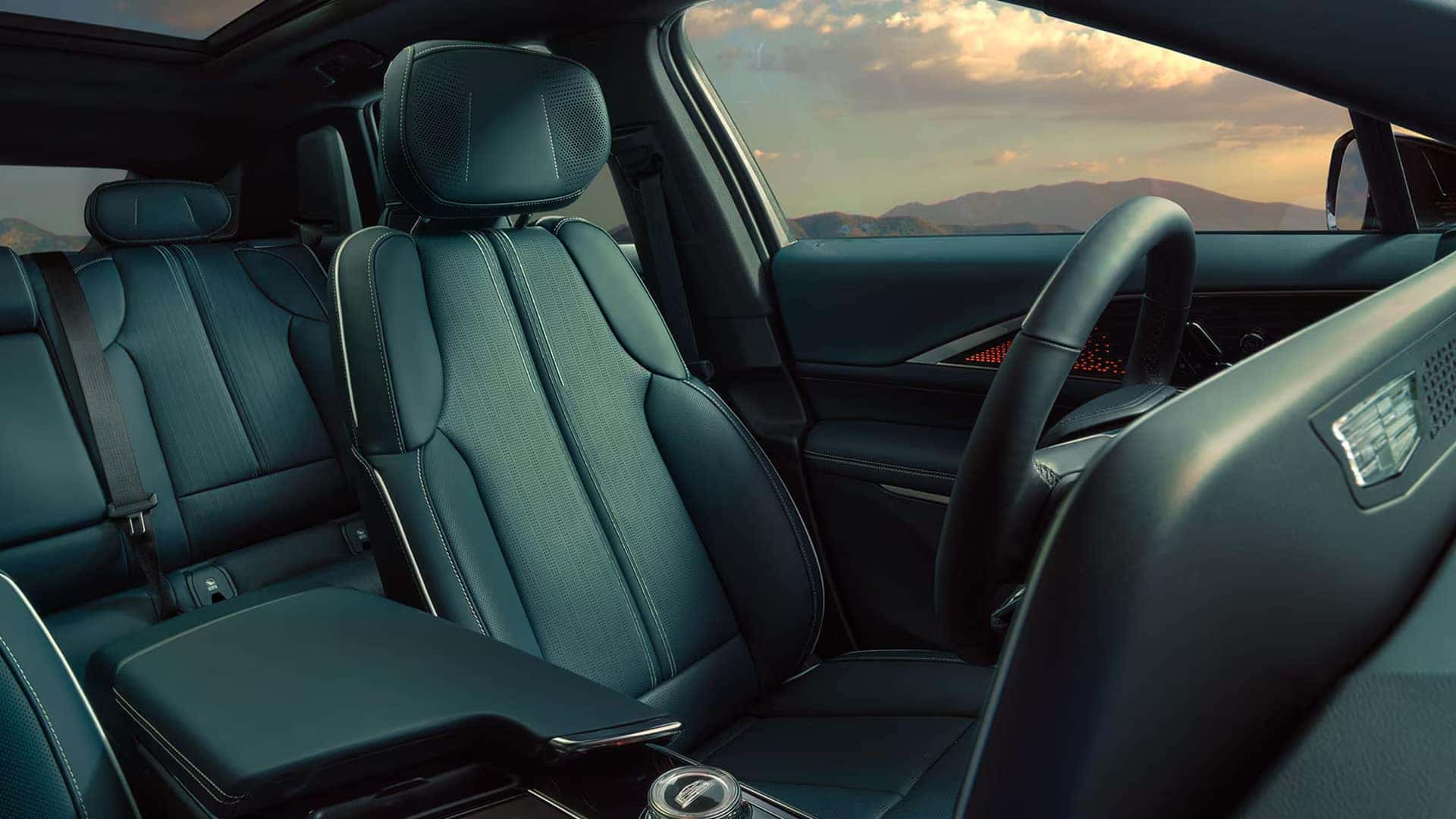 2026 Cadillac LYRIQ front and rear seating with premium upholstery, panoramic roof, and luxury cabin comfort