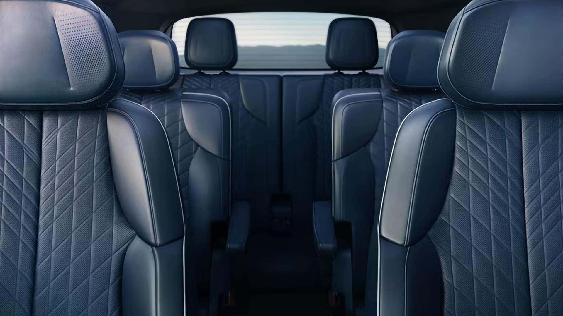 2026 Cadillac VISTIQ three row interior with quilted seating, second row captain’s chairs, and third row seats