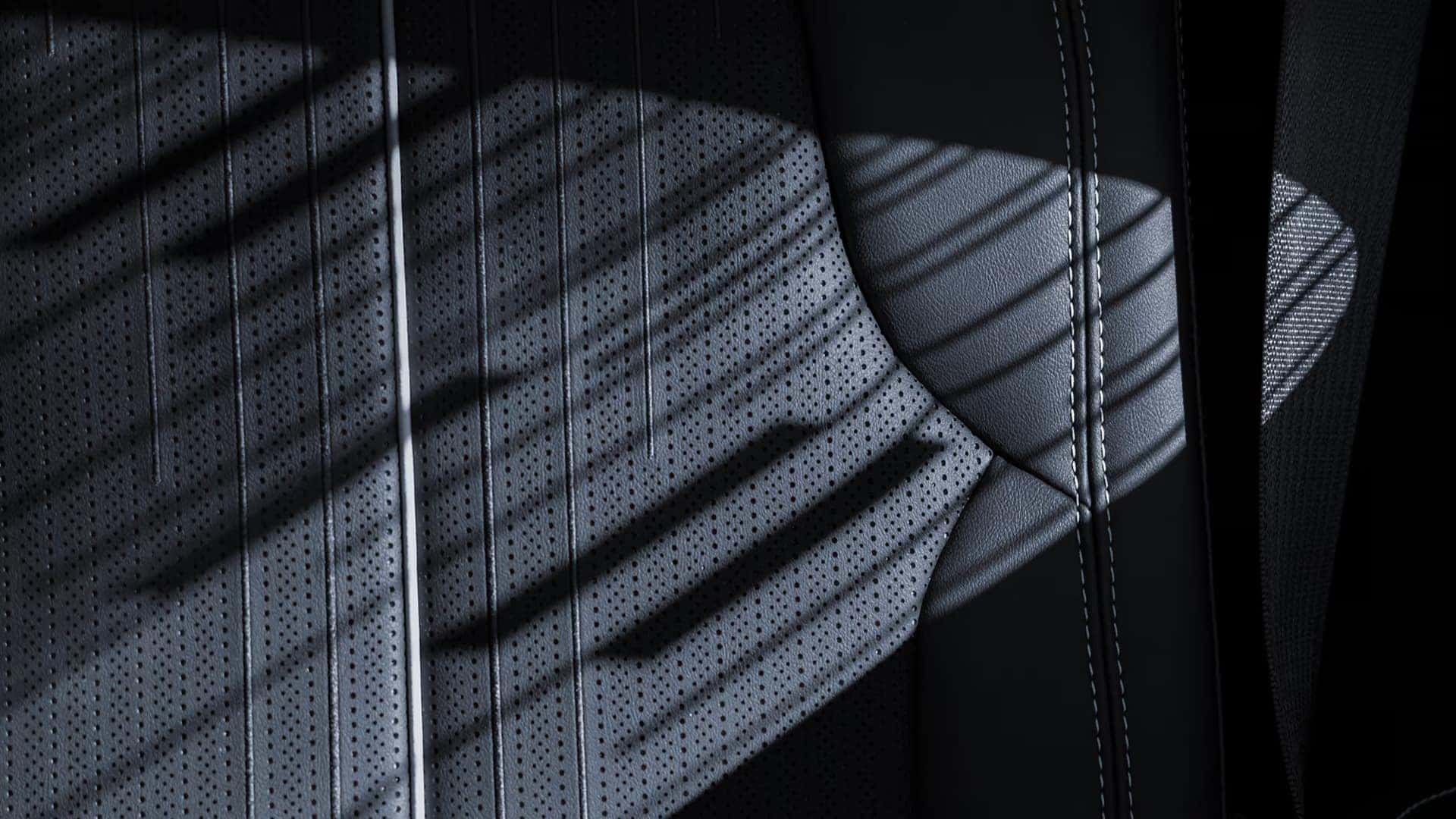 Close-up of 2026 Cadillac VISTIQ perforated seat material with detailed stitching and premium interior finish