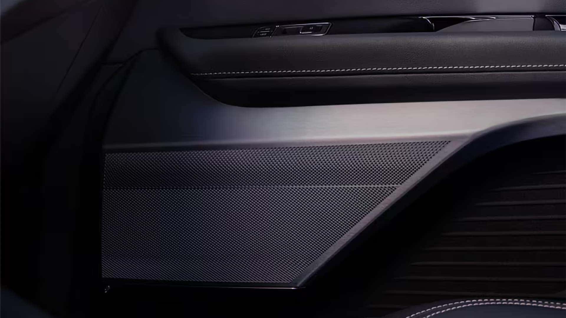 Close-up of the 2026 Cadillac VISTIQ interior speaker grille for the premium AKG Studio Audio system