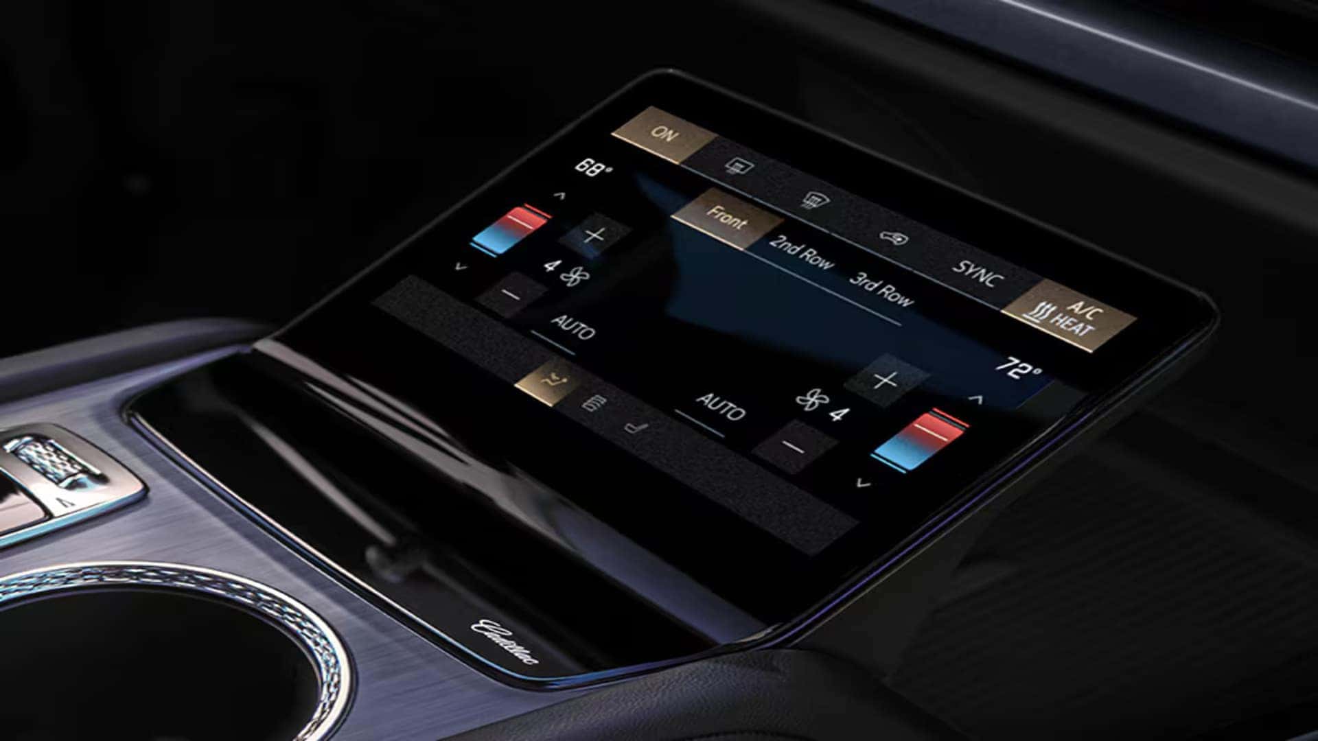 2026 Cadillac VISTIQ center console touchscreen showing climate controls for front, second-row, and third-row passengers
