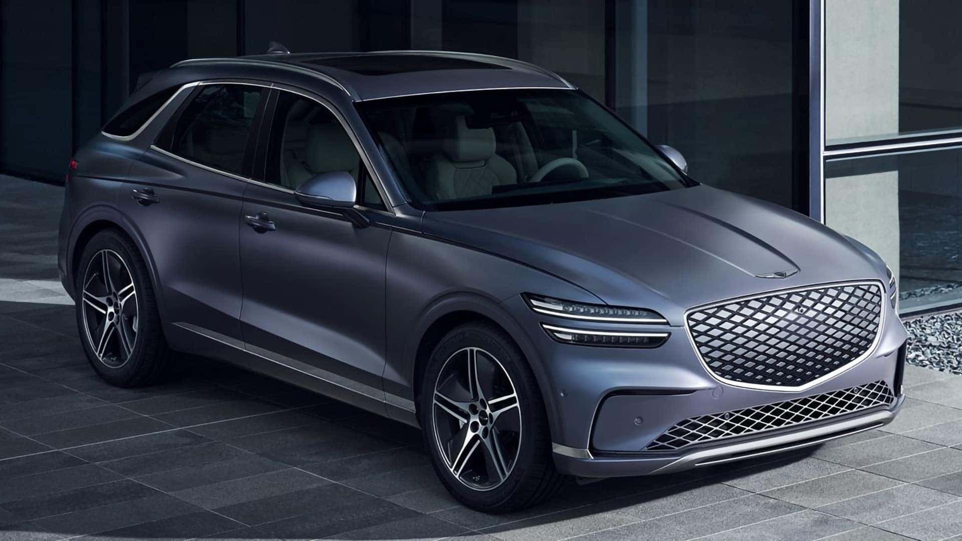 2026 Genesis Electrified GV70 front exterior view with G-Matrix grille and Two-Line LED headlights