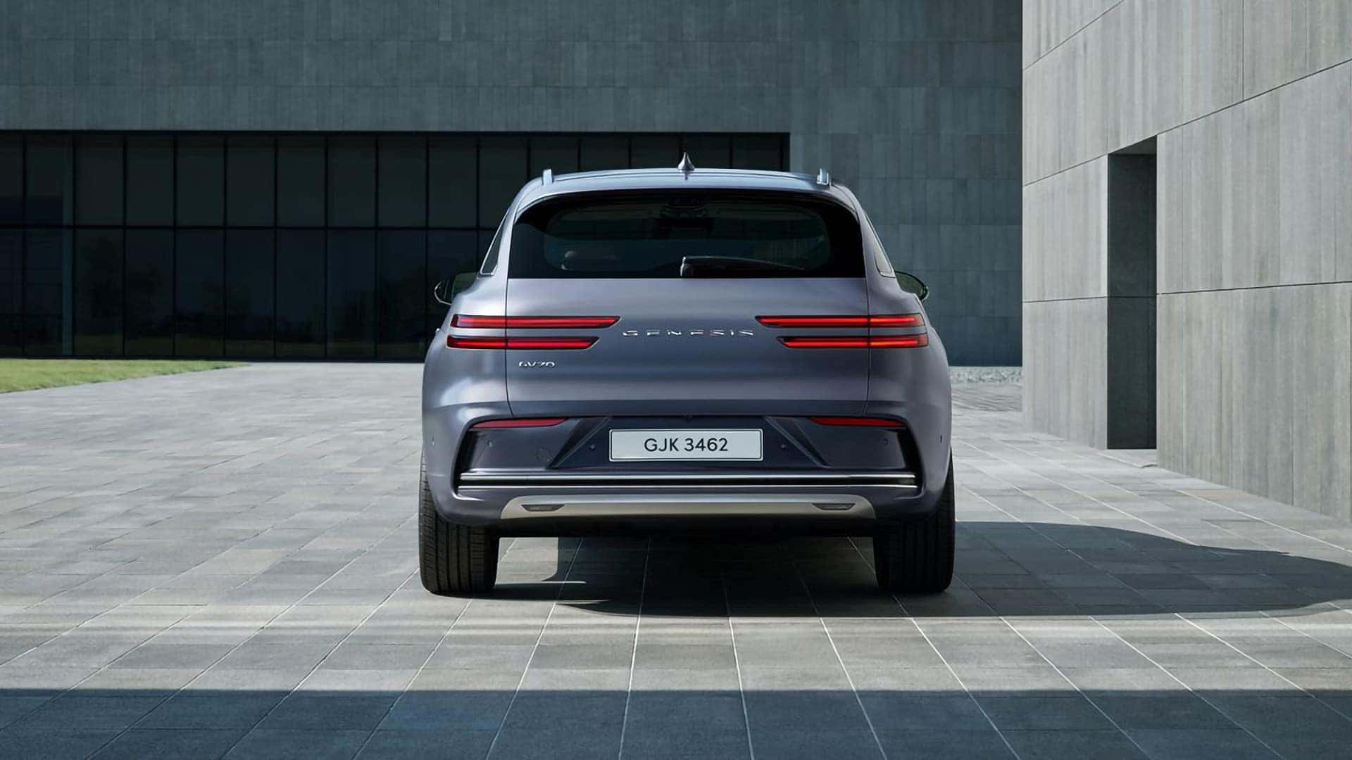 Rear view of the 2026 Genesis Electrified GV70 showing its Two-Line taillights, liftgate, and rear bumper design