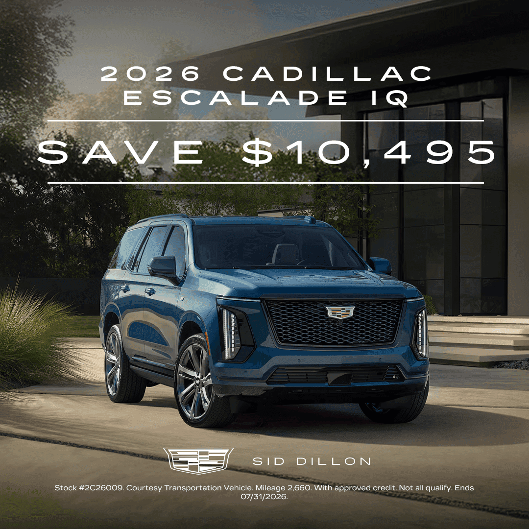 2026 Cadillac ESCALADE IQ Luxury July courtesy vehicle offer with $10,495 savings, 2,660 miles, and stock number 2C26009