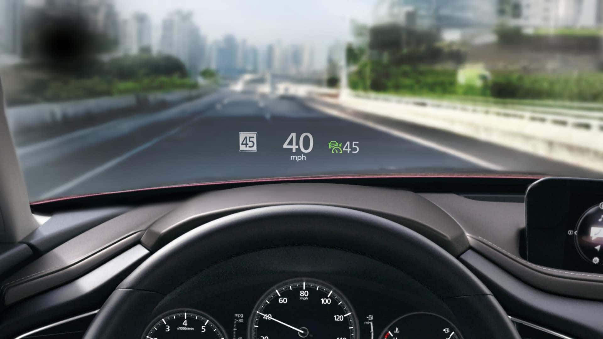 2026 Mazda CX-30 Active Driving Display showing speed limit, vehicle speed, and driver assistance information