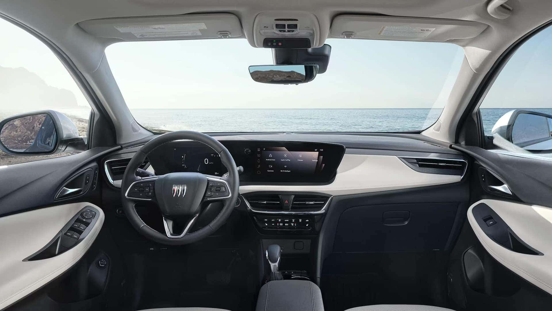 2026 Buick Encore GX dashboard with steering wheel, digital displays, and two-tone trim