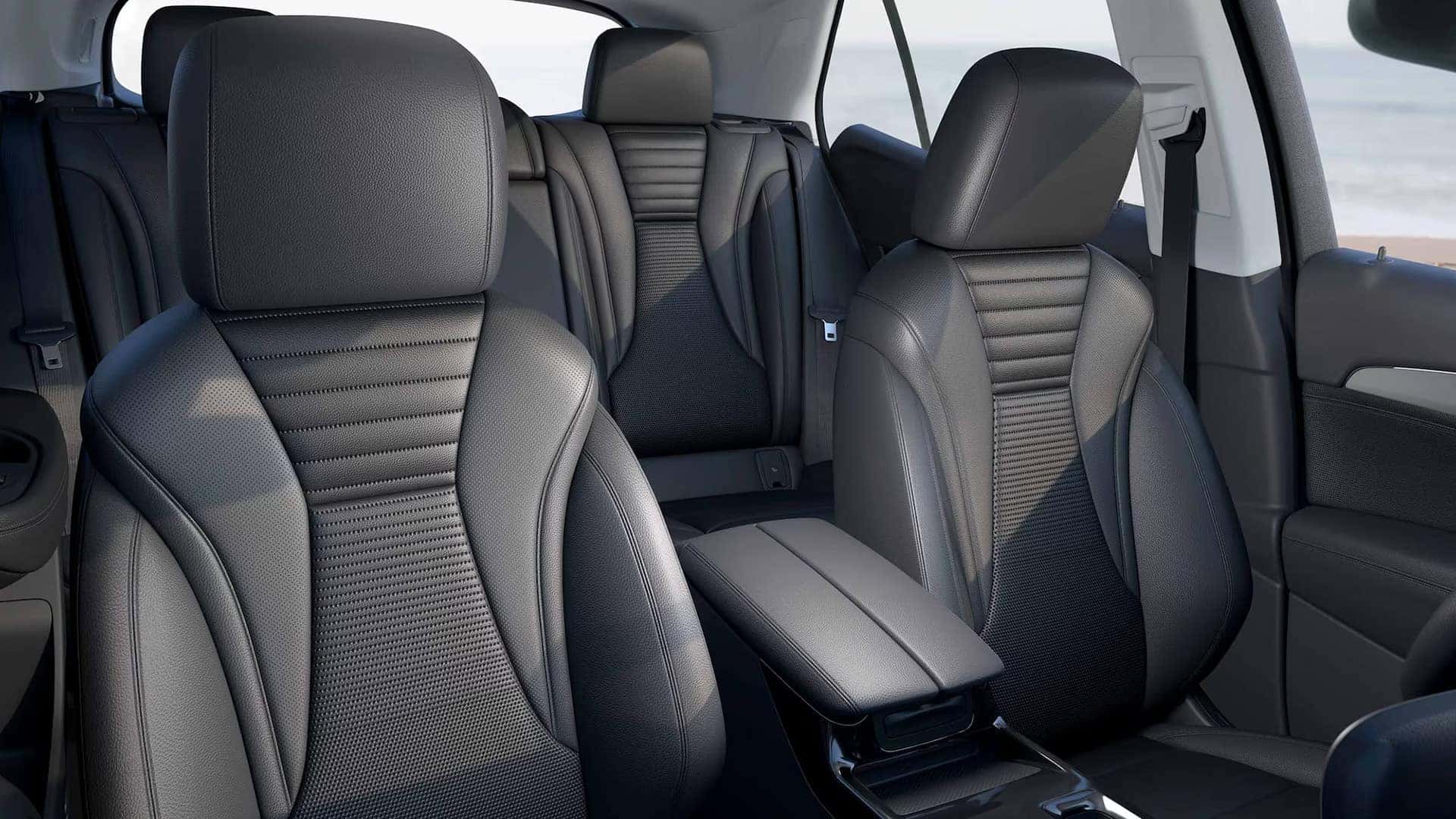 Black perforated seating and two-row cabin inside the 2026 Buick Envision