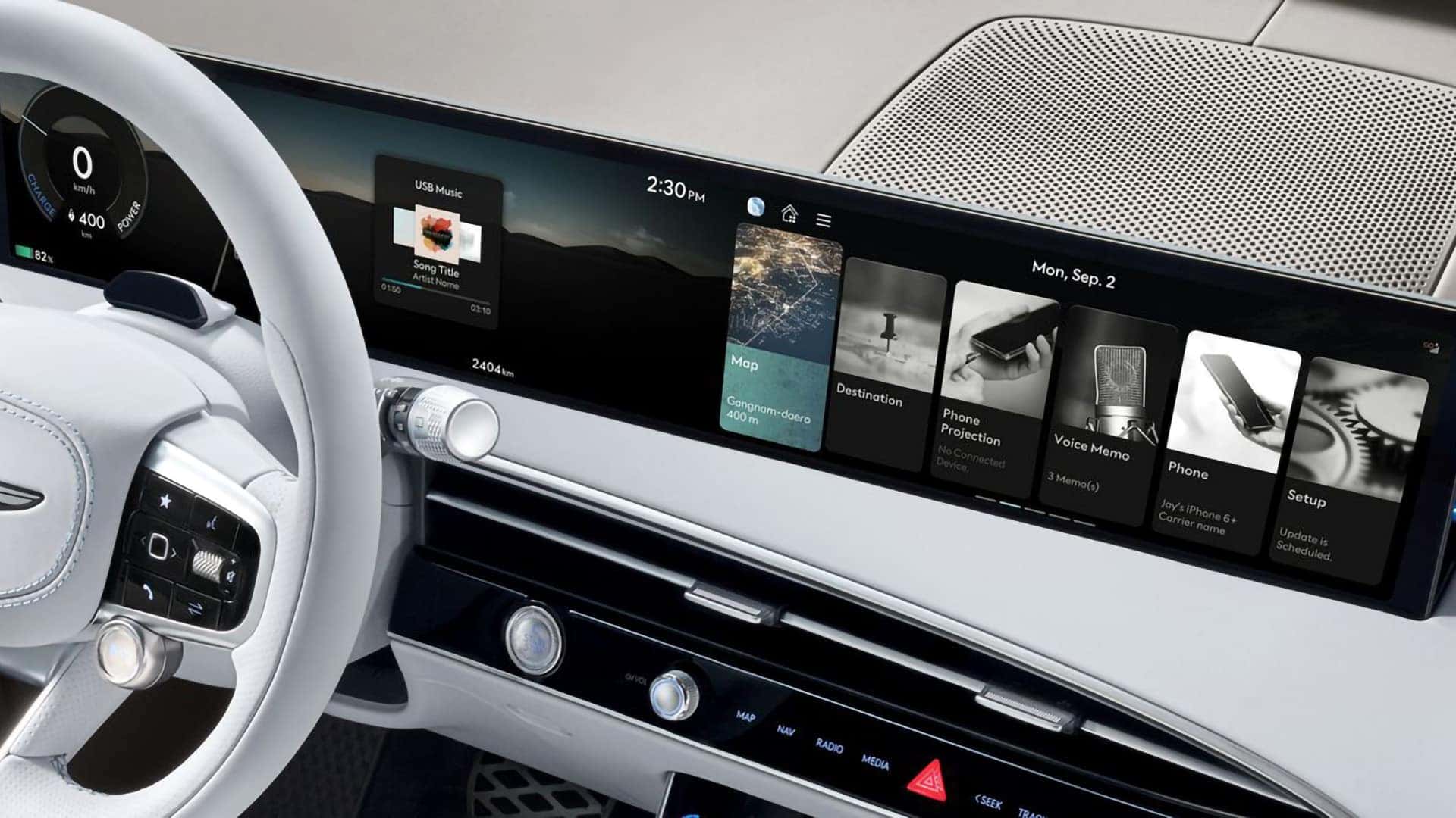 Close-up of the 2026 Genesis Electrified GV70 27-inch OLED display showing navigation, media, phone, and vehicle settings