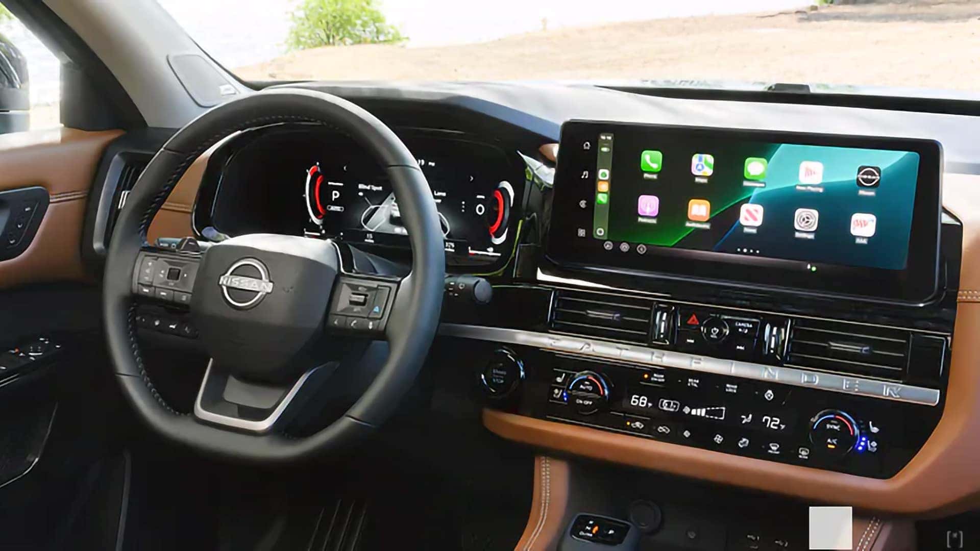 2026 Nissan Pathfinder dashboard with digital instrument display and Apple CarPlay touchscreen