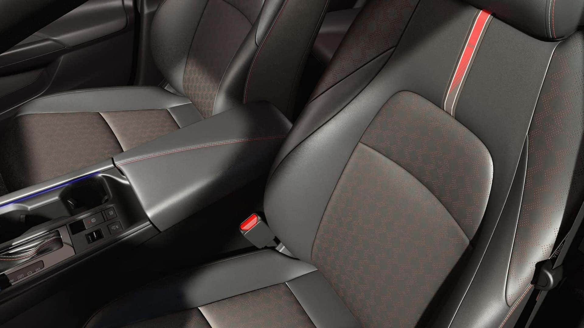 2026 Nissan Sentra front seats with patterned black upholstery, red accents, and contrast stitching