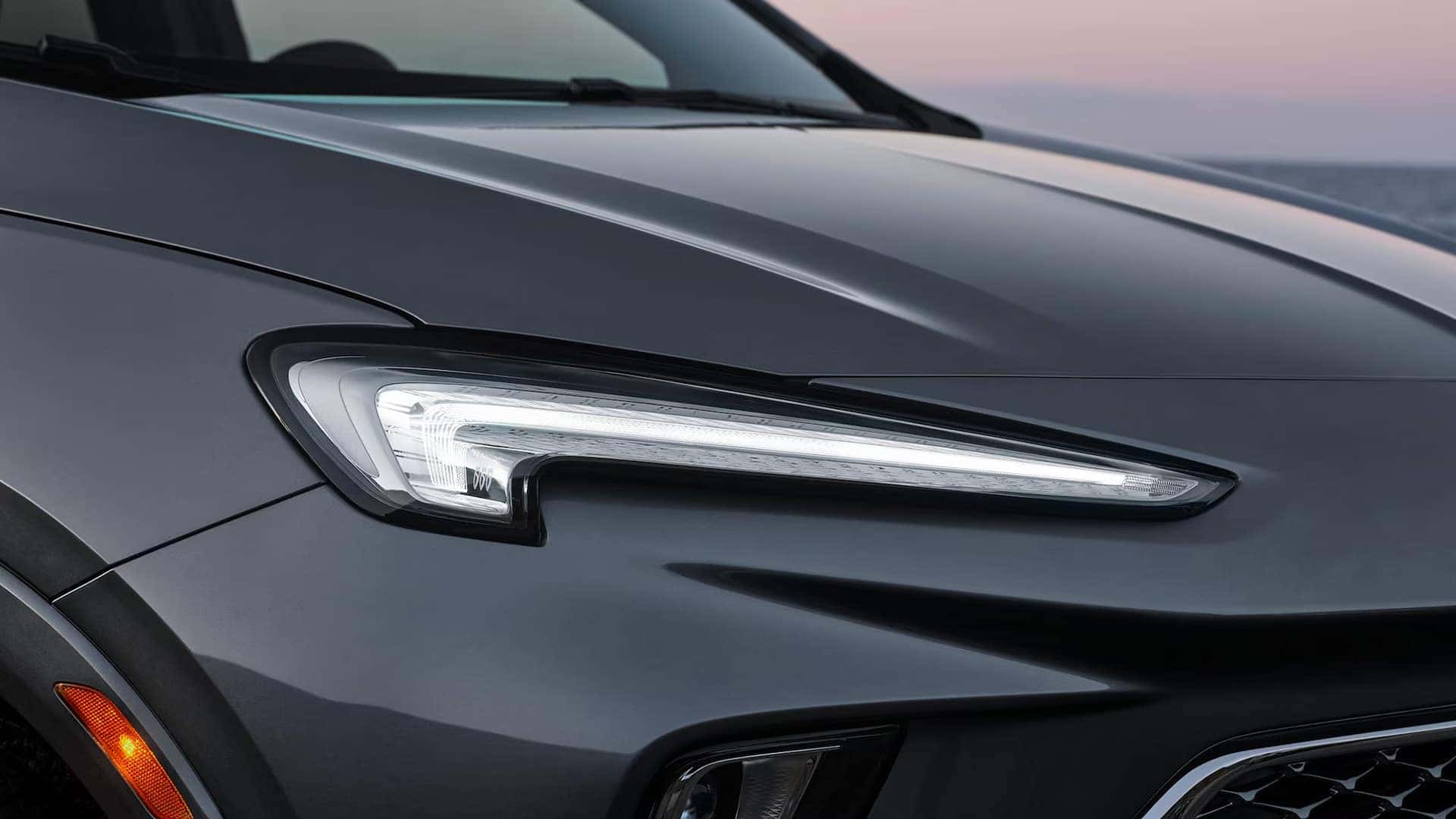 Close-up of the illuminated LED lighting on a gray 2026 Buick Encore GX