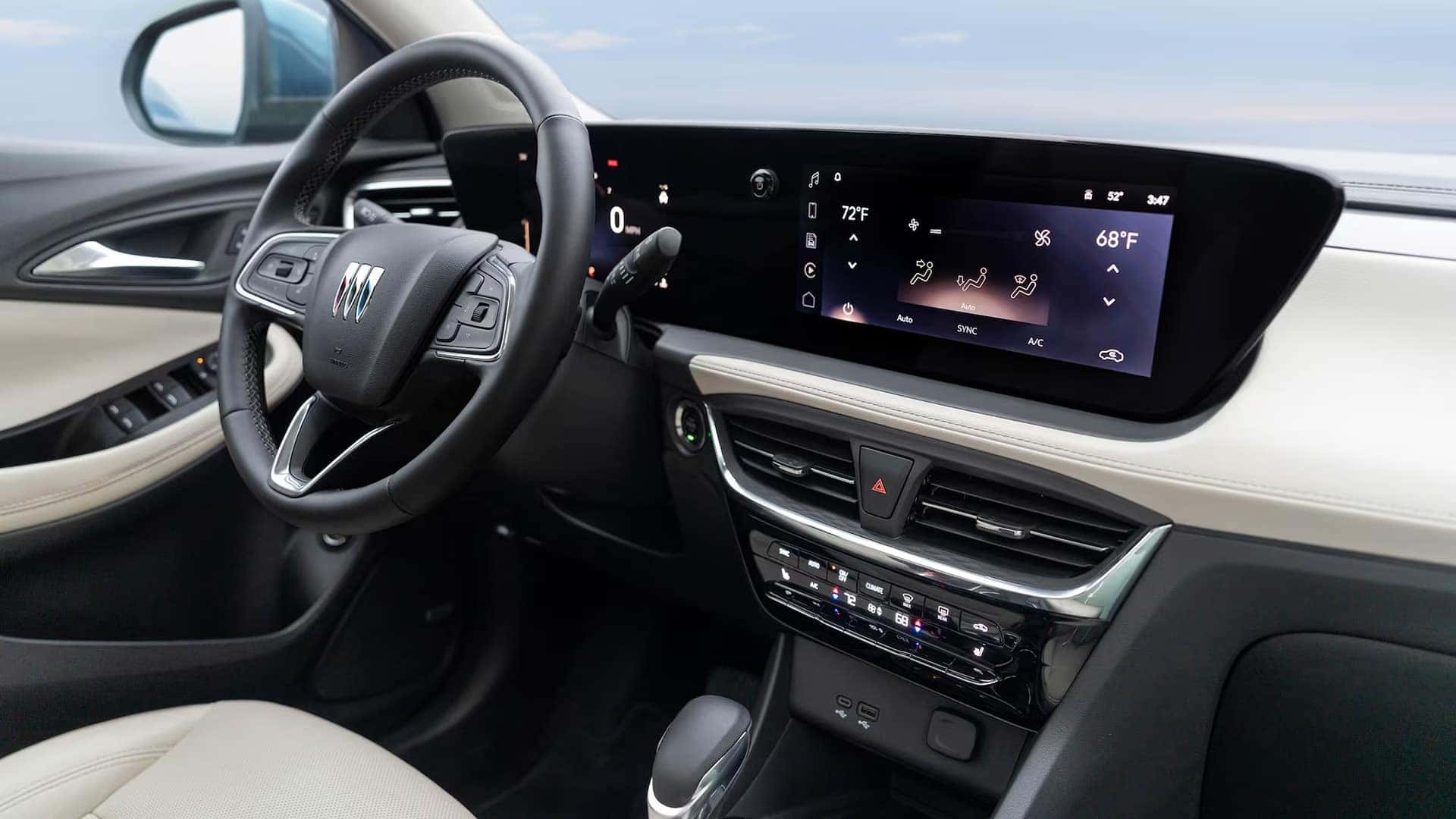 2026 Buick Encore GX driver area with digital instrument cluster and infotainment touchscreen
