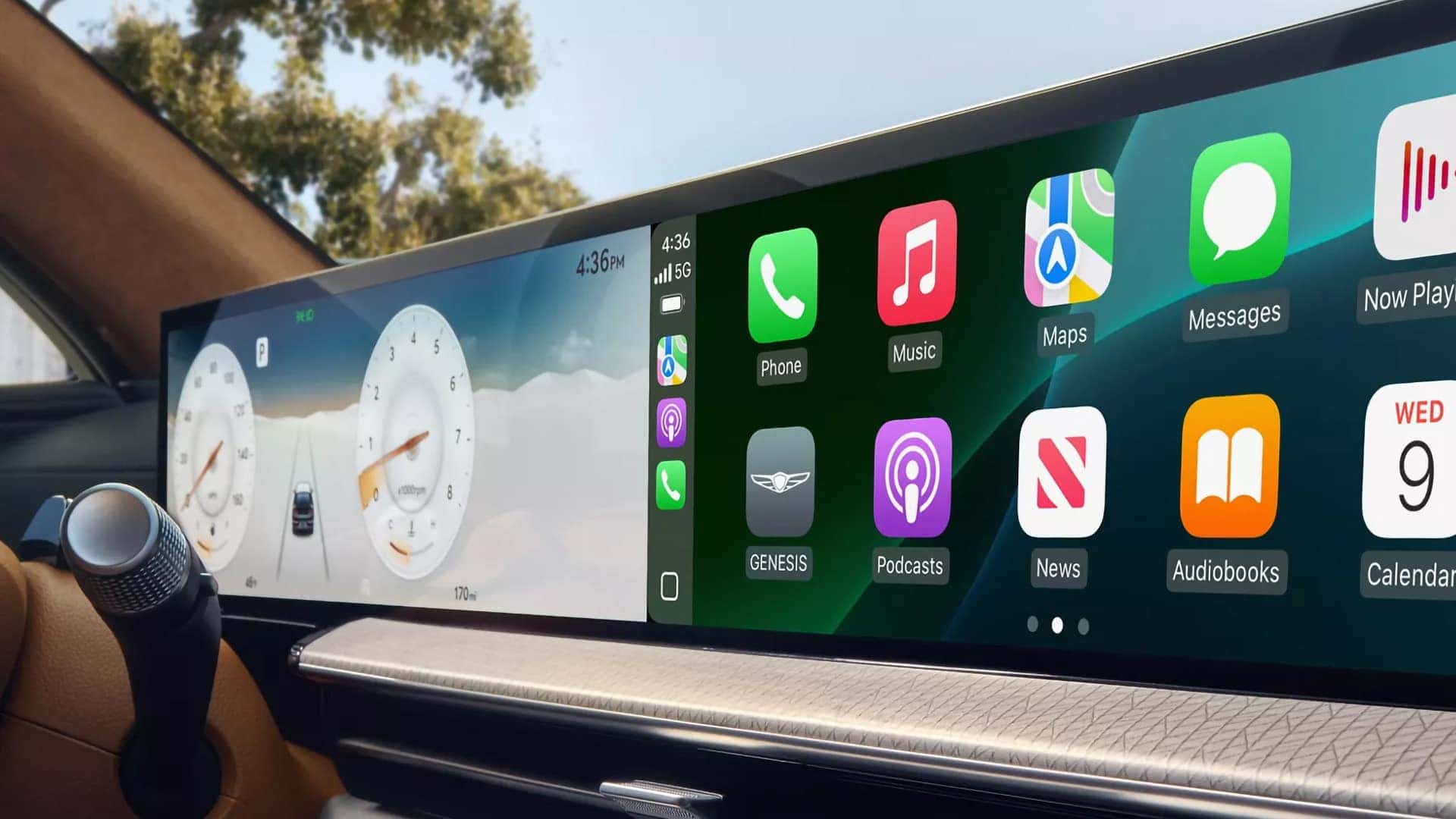Apple CarPlay displayed on the 2026 Genesis Electrified GV70 panoramic OLED screen with phone, maps, music, and messaging apps