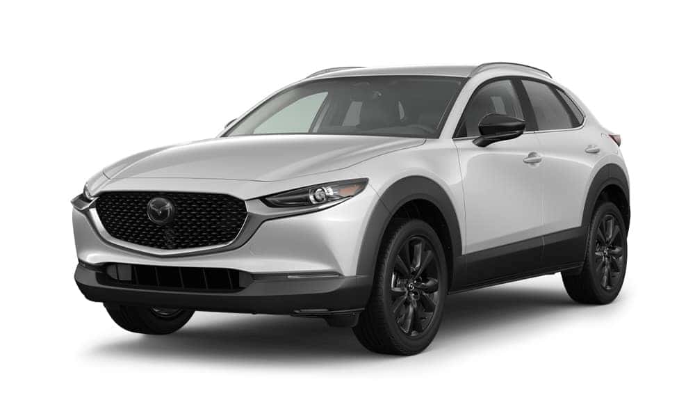 White 2026 Mazda CX-30 2.5 S Select Sport with black wheels shown from the front three-quarter angle