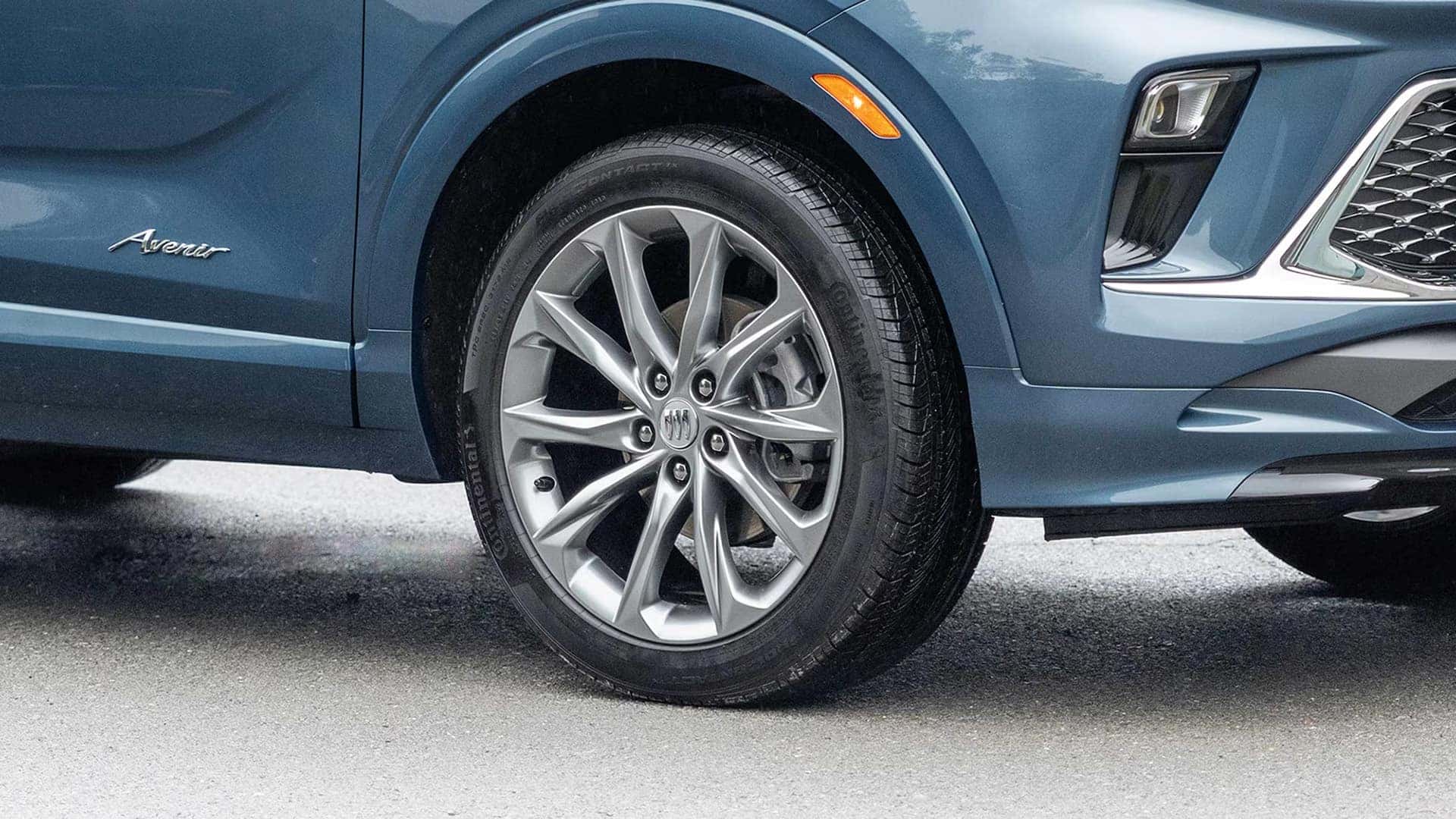Close-up of a 2026 Buick Encore GX Avenir aluminum wheel with Pearl Nickel finish