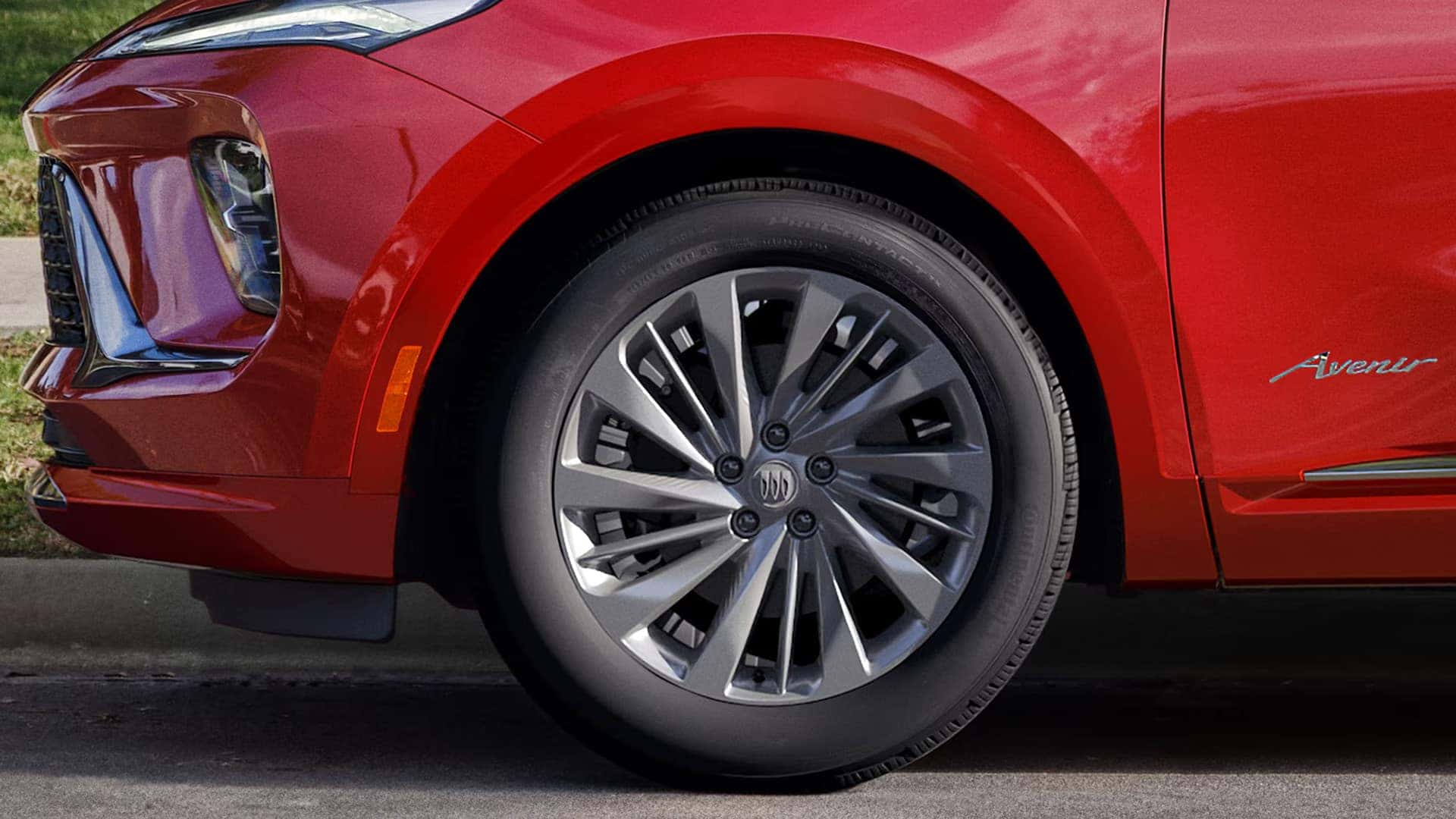 Close-up of a 2026 Buick Envision Avenir 20-inch alloy wheel with Pearl Nickel finish
