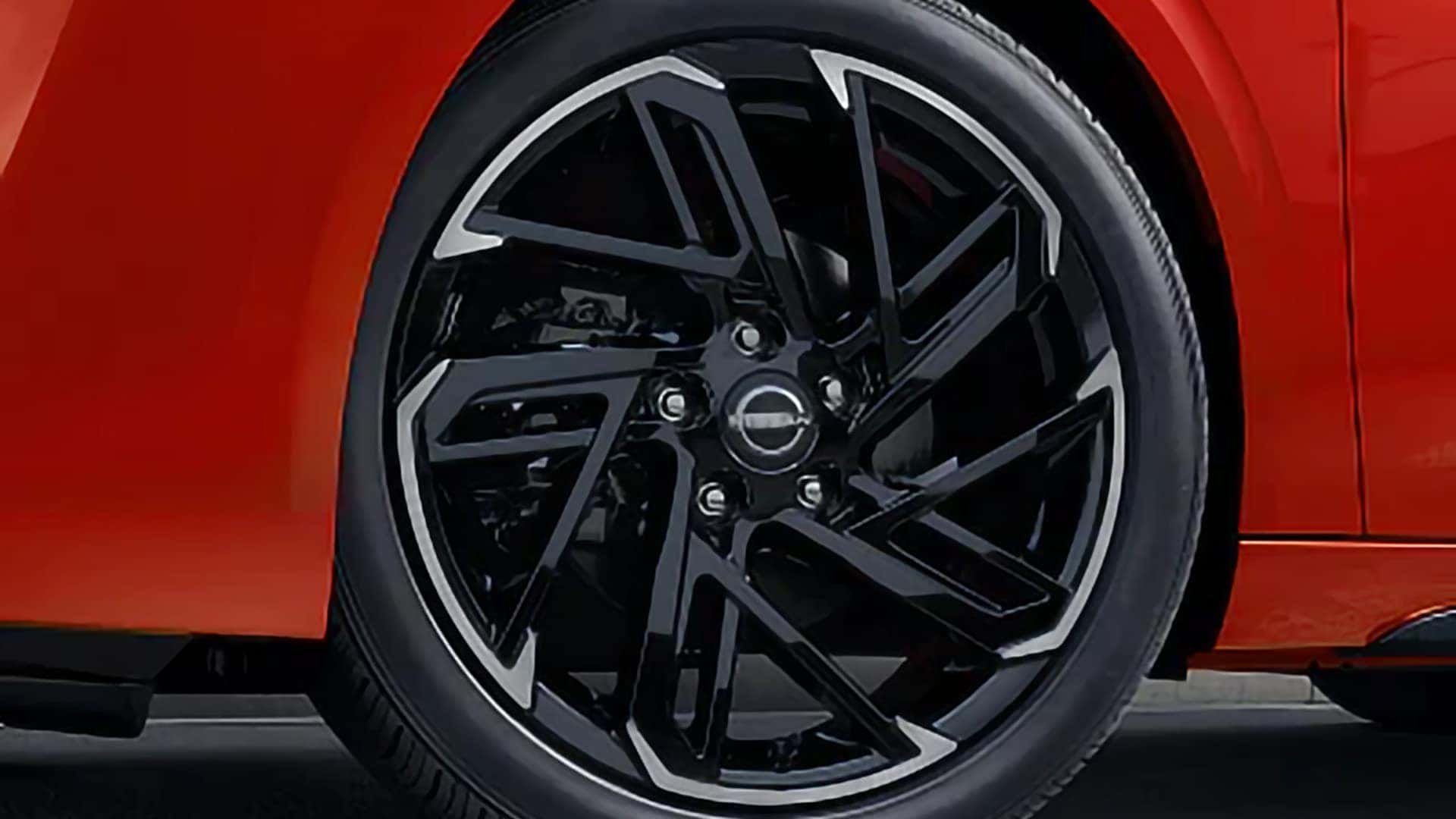 Close-up of a black and machined aluminum-alloy wheel on the 2026 Nissan Sentra SR